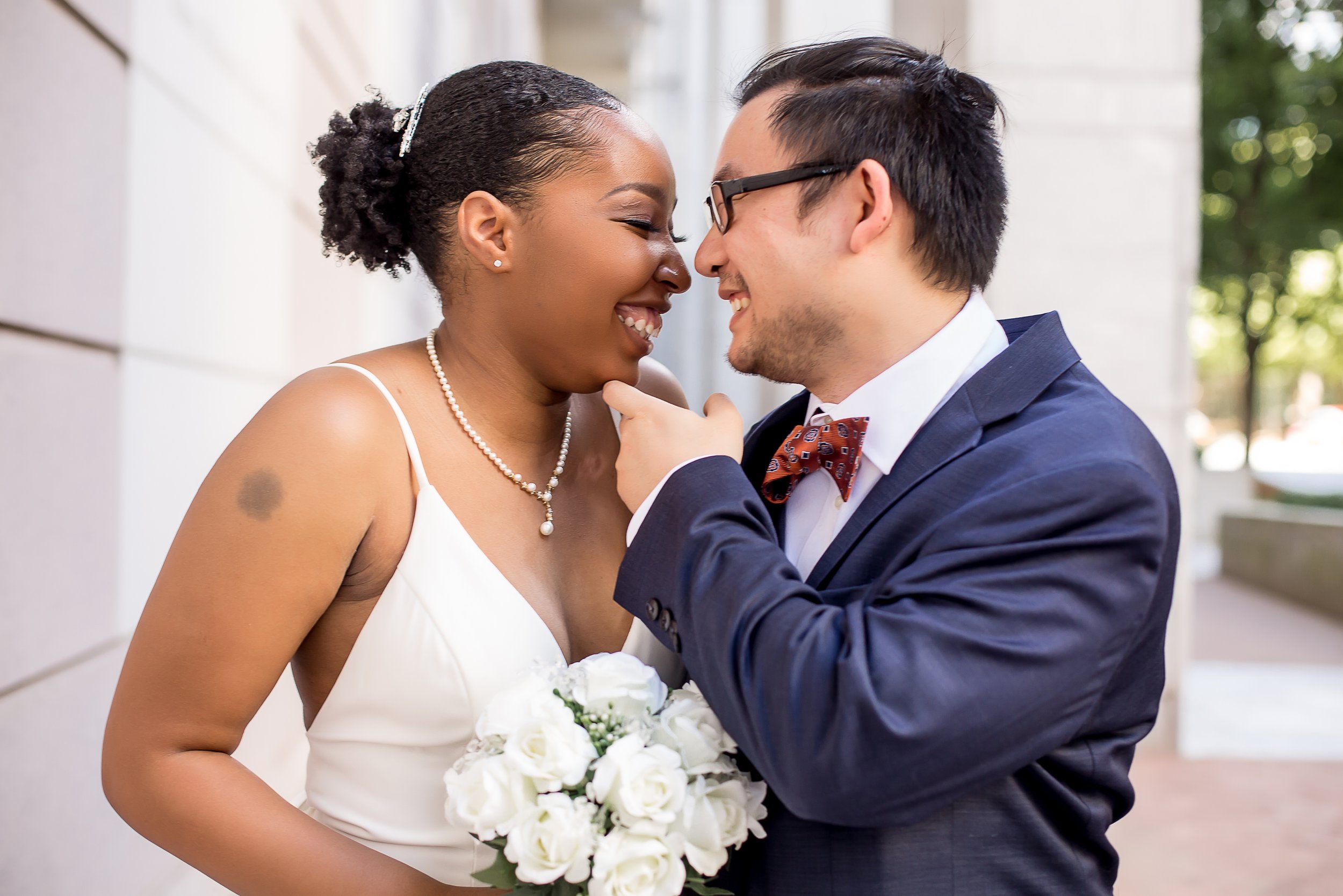 charlotte nc wedding photographer downtown elopement courthouse wedding biracial couple spring stylish