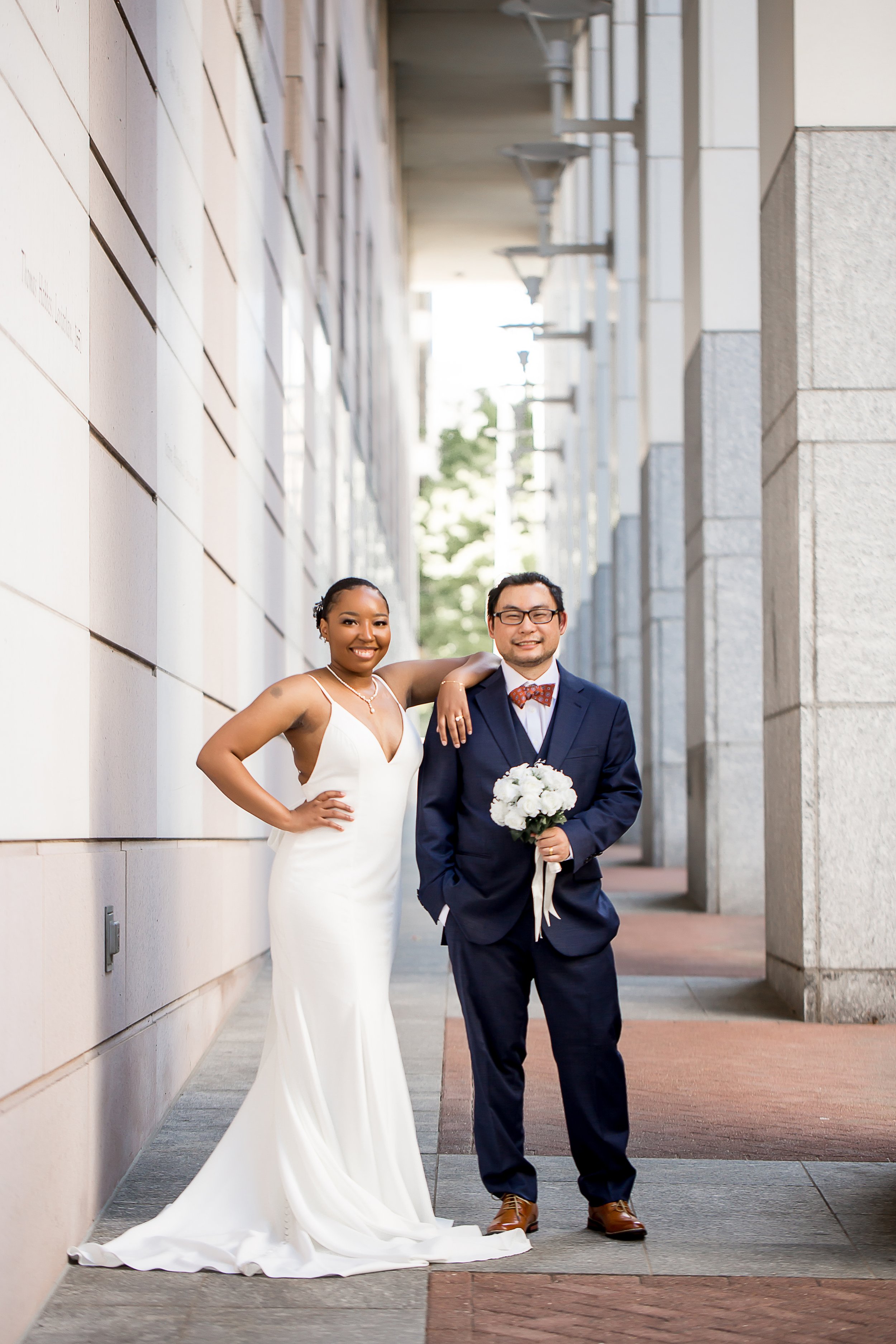 charlotte nc wedding photographer downtown elopement courthouse wedding biracial couple spring stylish