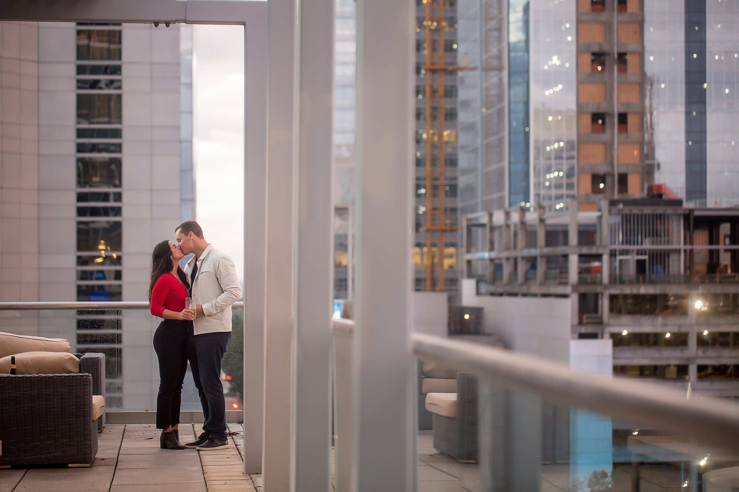charlotte north carolina photographer engagement session uptown downtown proposal champagne skyline
