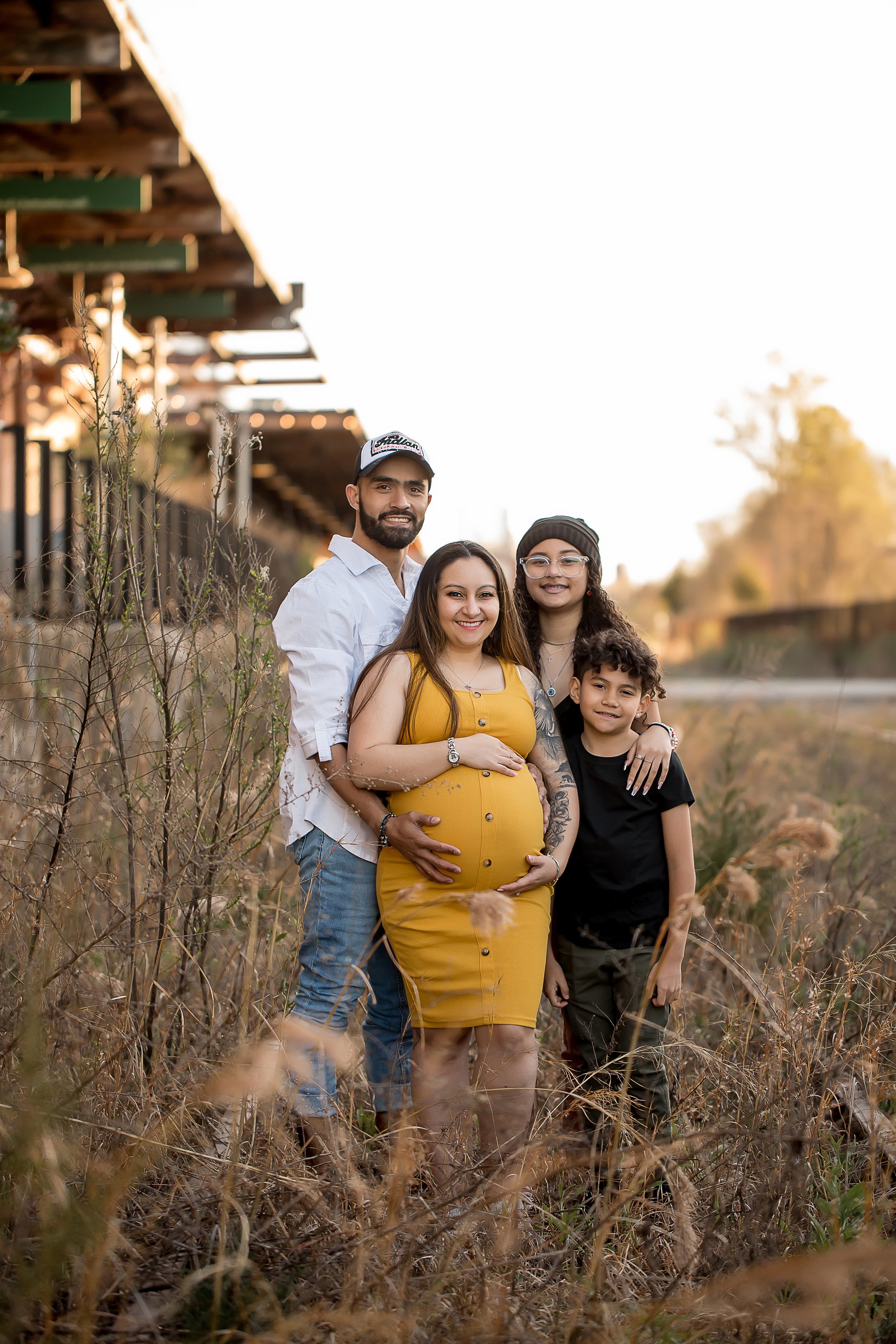 charlotte north carolina family photographer maternity session hip ripped jeans camp north end