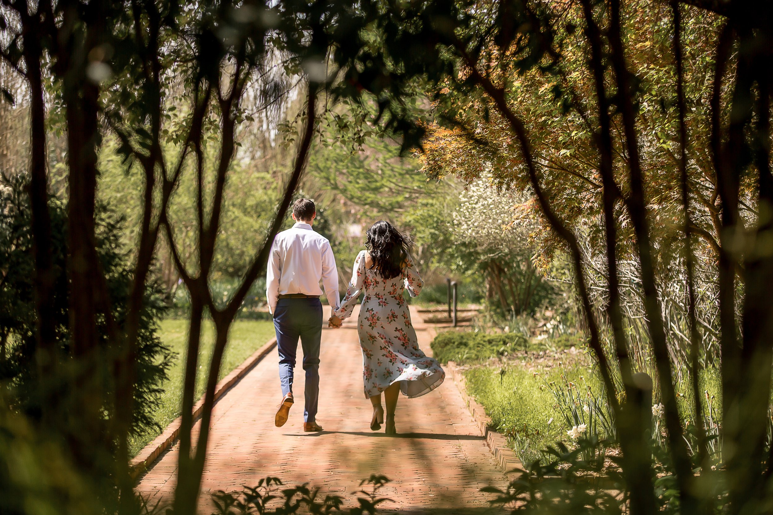 charlotte north carolina wedding portrait photographer daniel stowe botanical garden proposal engagement couple engaged white garden