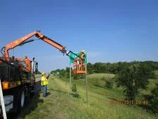 Cardinal Creek_DOT installing new sign.jpeg