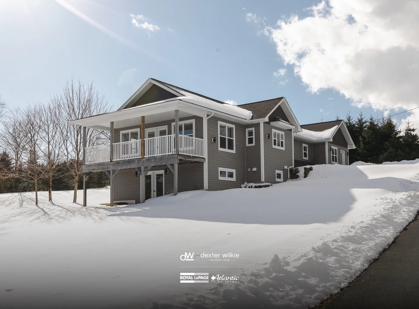 From the covered front porch, watch cruise ships make their way to Halifax, sailboats cross open water, and the horizon become part of your everyday backdrop. Inside, a thoughtfully designed main level features quartz countertops, stainless steel app