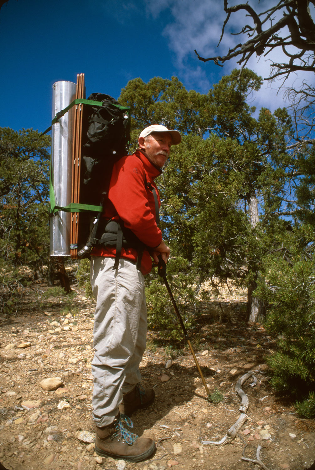  Tony Foster backpacking with equipment in the Grand Canyon. Courtesy of Foster Art &amp; Wilderness Foundation. 