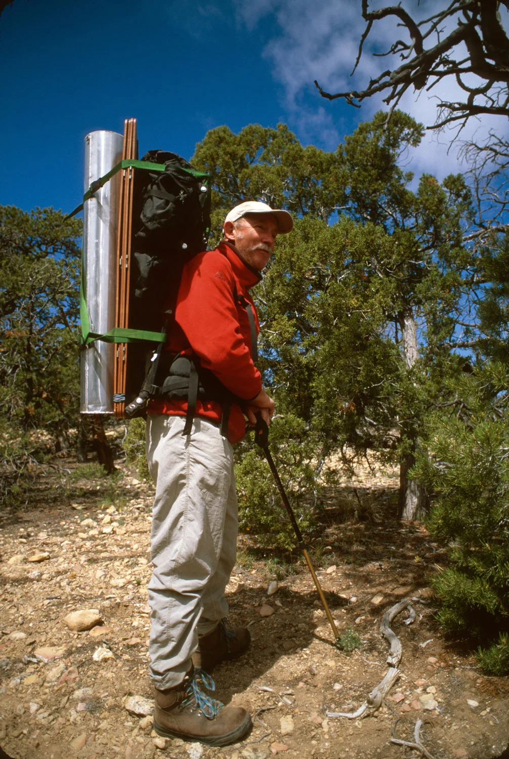Tony Foster backpacking with equipment in the Grand Canyon. Courtesy of Foster Art & Wilderness Foundation.