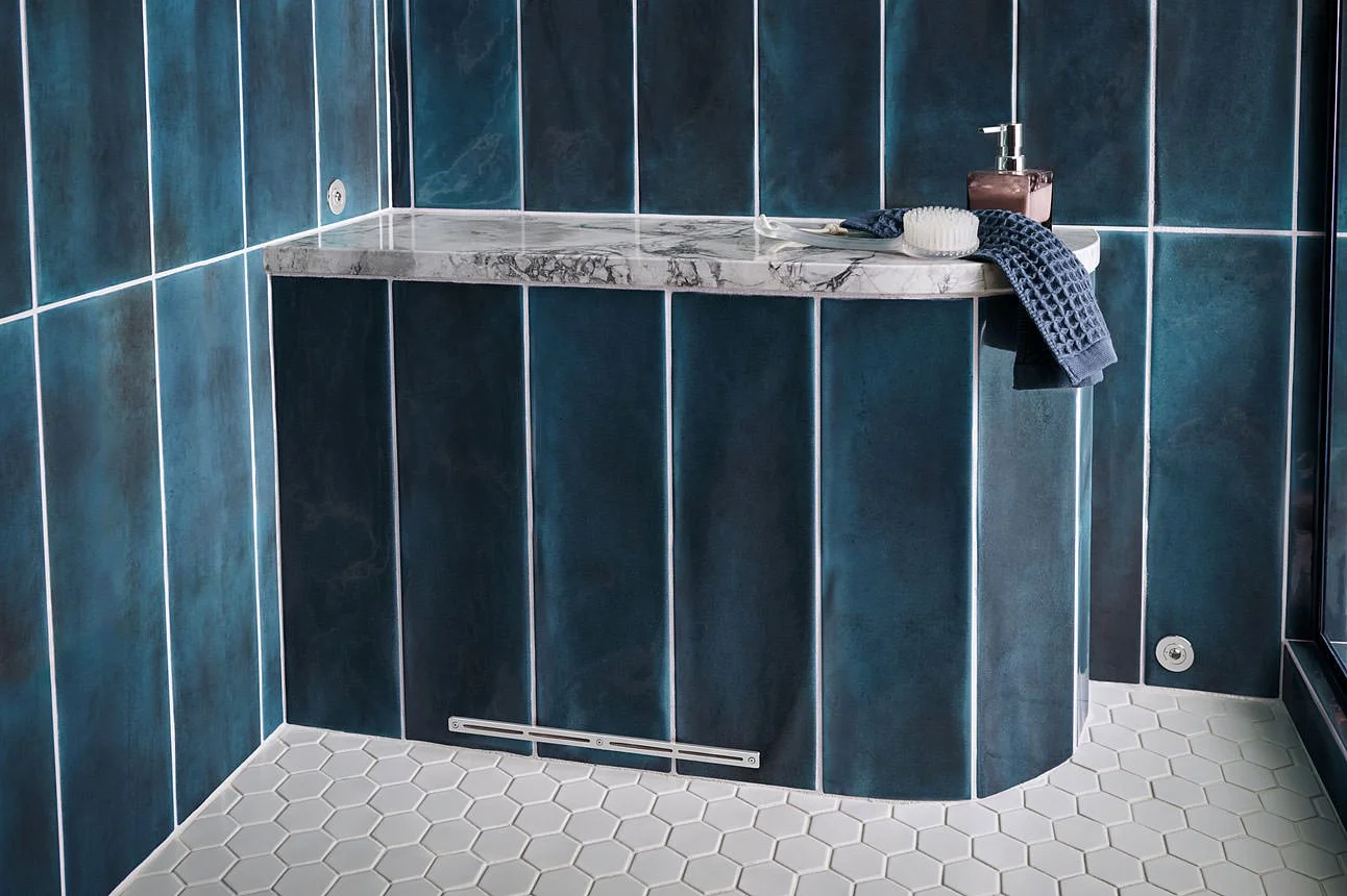 A walk-in shower with the Airmada AirJet Shower Drying System