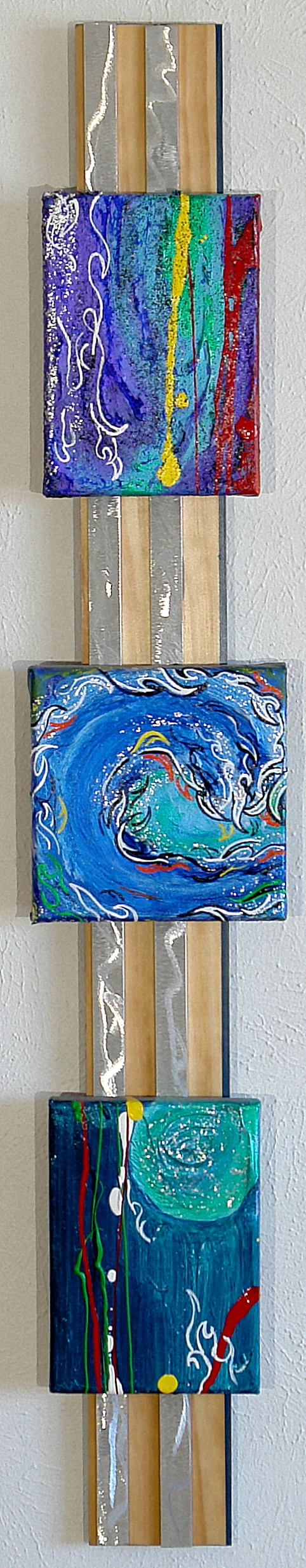 Ripple  Acrylic canvas mounted on brushed aluminum and stained wood  1 1/2'' Deep  36'' Tall x 6'' Wide  $300.00
