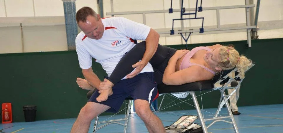 Dr. Mac stretching 2x Olympic Gold Medalist Kayla Harrison before her competition in the 2012 London Olympics! Mac has been working with USA Judo since 2004. 