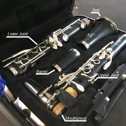 A disassembled clarinet in its case
