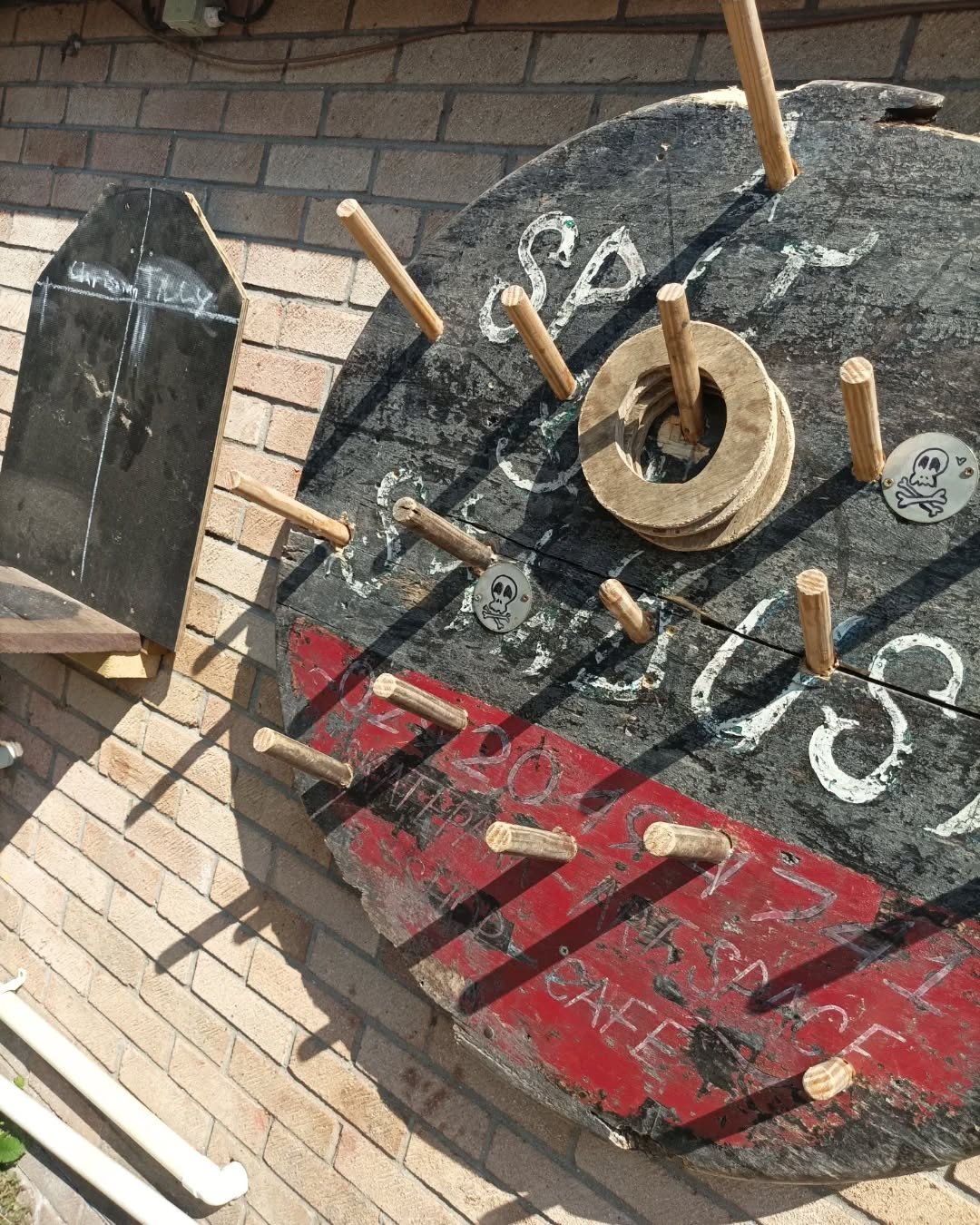 Hottest day this year, meet hottest GAME this year! Thought the ol' 'swinging skateboard wheel on a string' game was infuriating enough....meet 'hooplala' (?) gain a point for getting the hoop on...loose all ya points if U hook a skull 💀 simple 🤪🤬