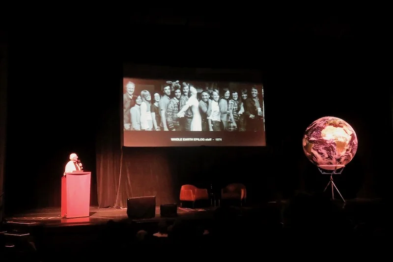 Stewart Brand gives a short talk about the Whole Earth catalog at the public evening event at the Cowell Theatre. Photo by Fabrice Florin .