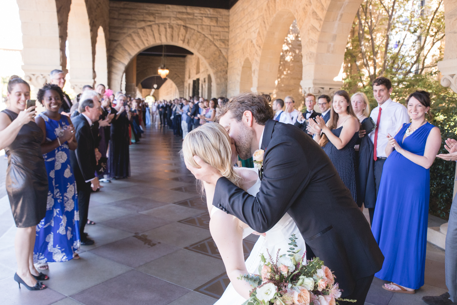 bride-groom-kiss-standford-church.jpg