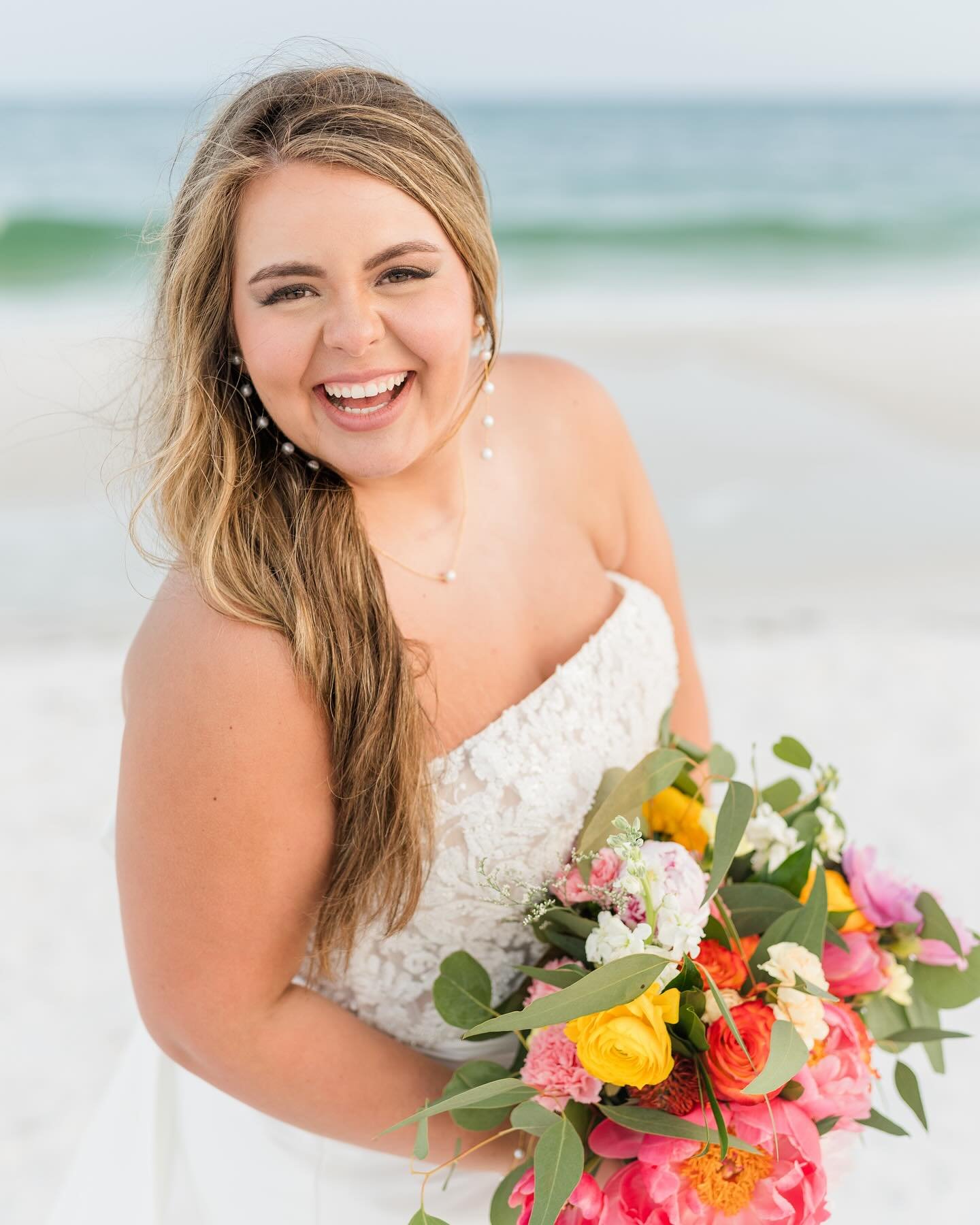 I&rsquo;m going to be staring at these sneak peeks all day!! I love the bright vibrant colors that Laine chose for their big day 💕 

#pensacolabeach #pensacolabeachwedding #pensacolabeachweddingphotographer #alabamaweddings #alabamaweddingphotograph