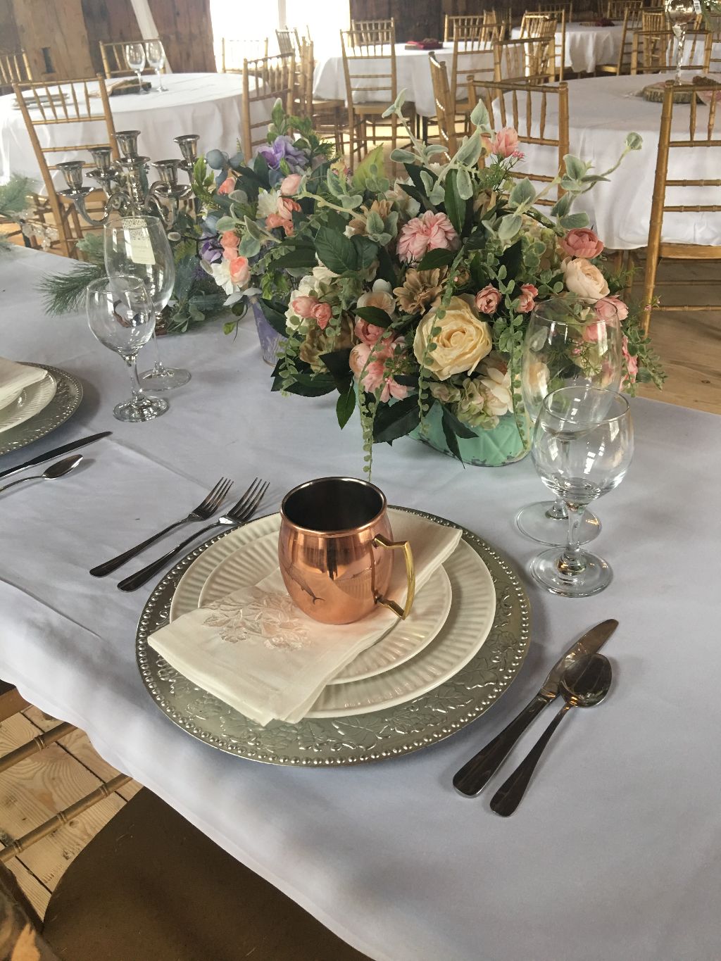 head table with plate and surrounding tables.JPG