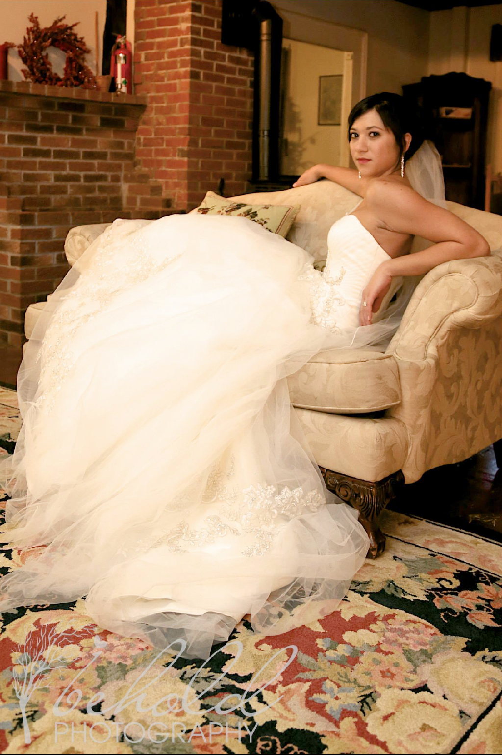 emily in gown on loveseat.PNG