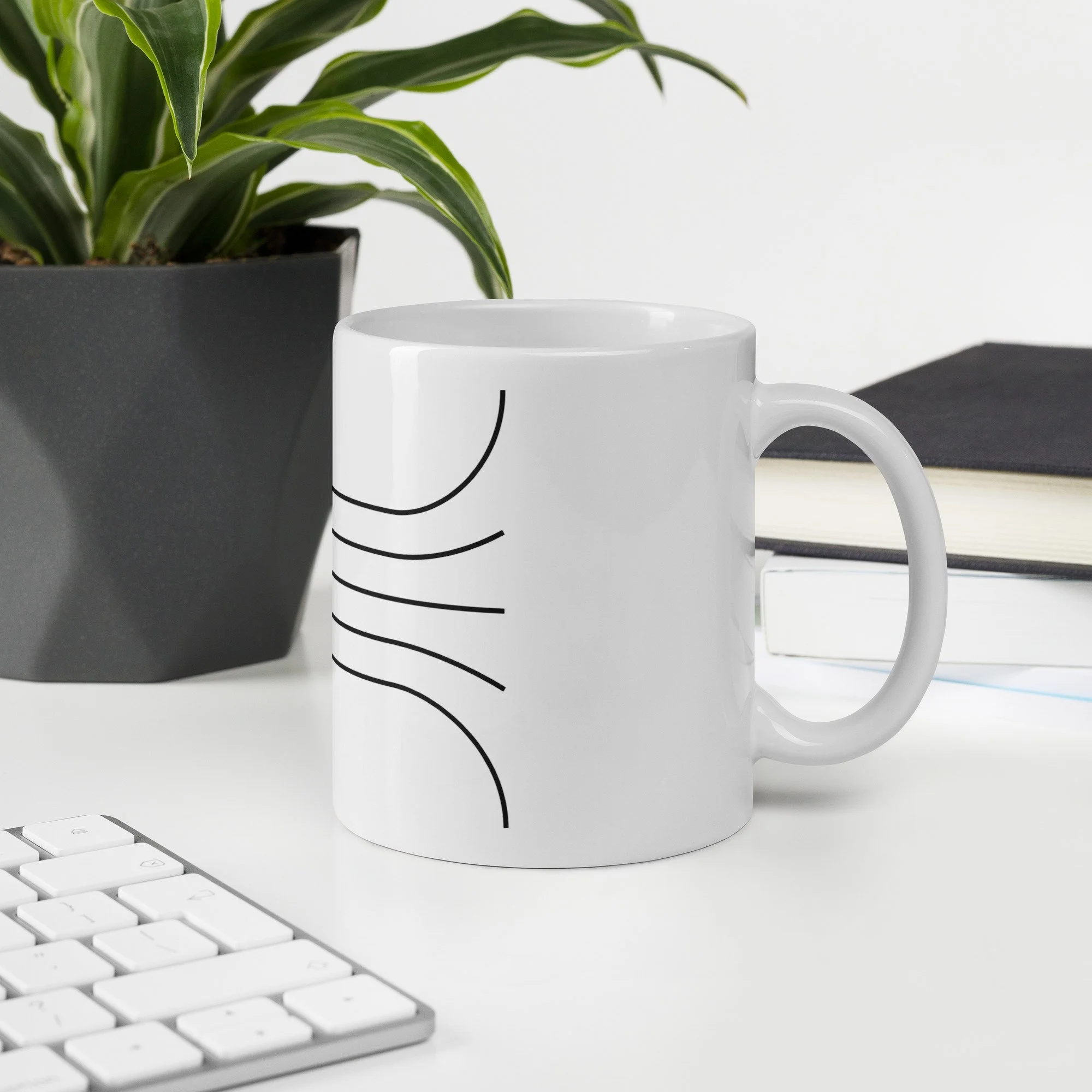 white-glossy-mug-white-11-oz-office-environment-6a283bec8febc.jpg