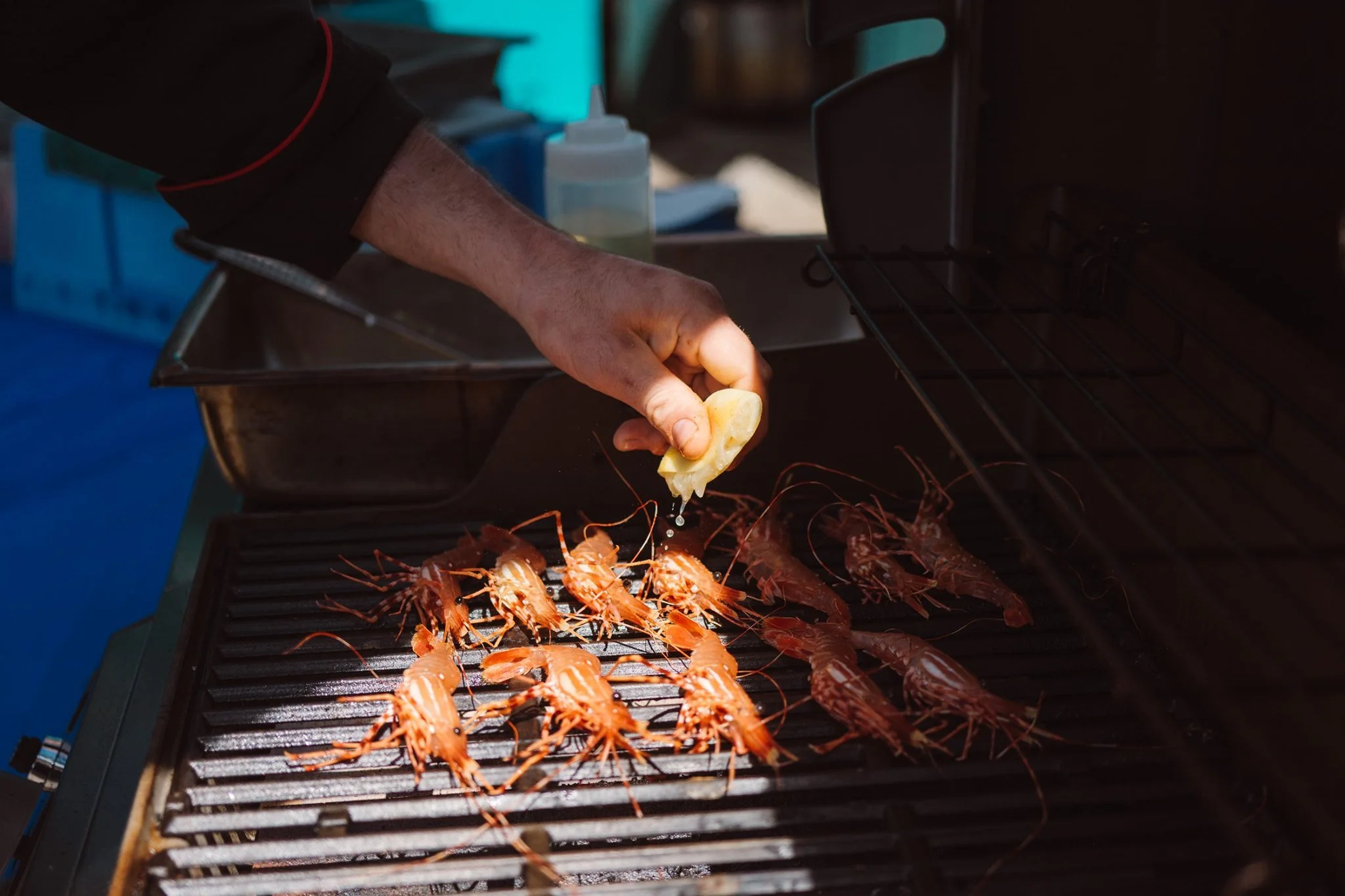 spot prawn on grill squeeze lemon.jpg