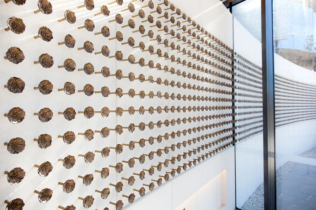 Creative metalwork by Di Emme Creative Solutions - brass poppy flower wall