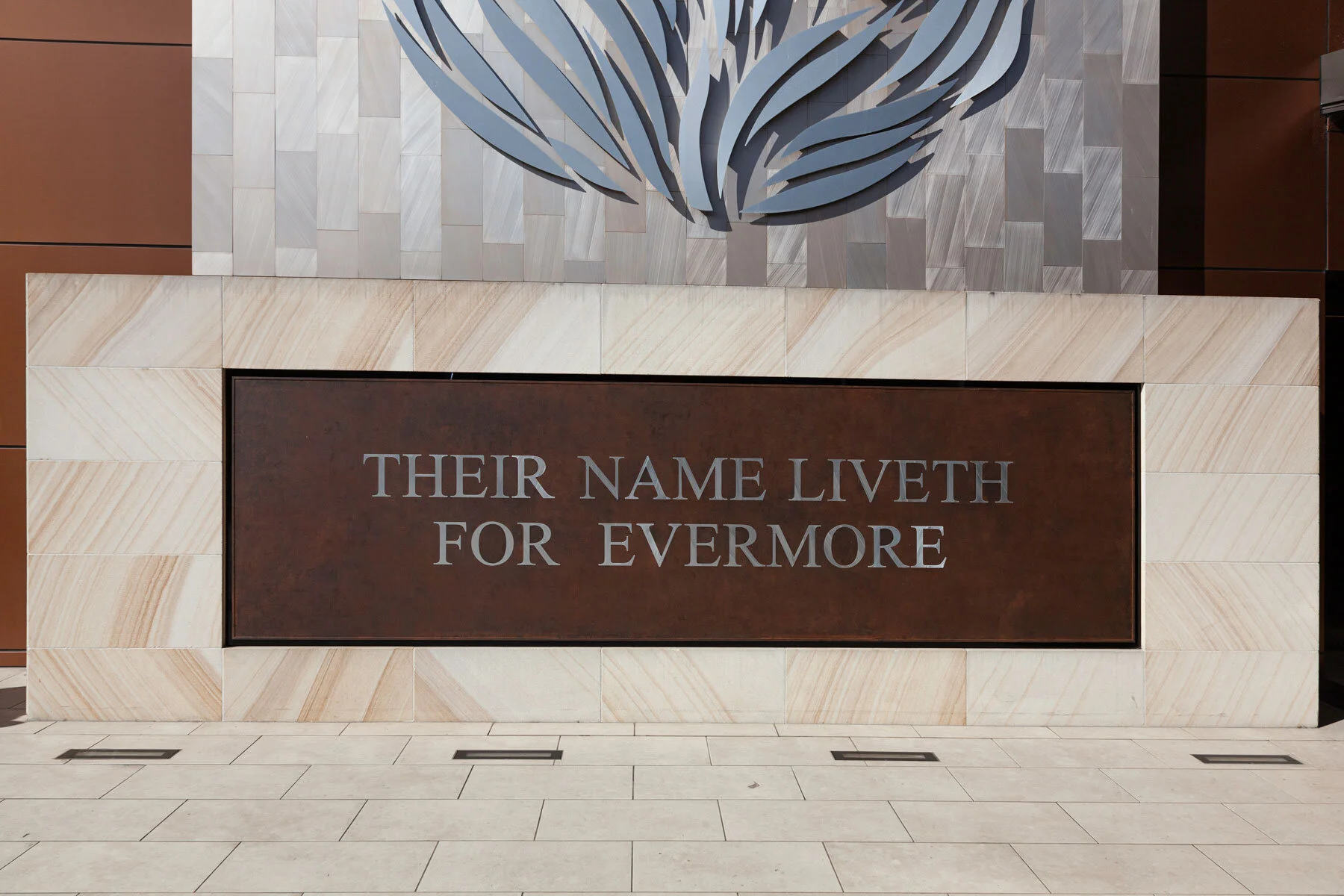 alucobond with painted rust finish and linish inset letters memorial plaque