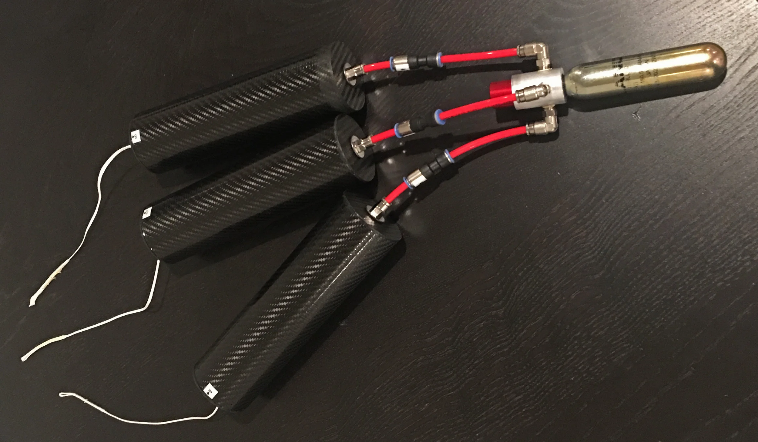 Parachutes packed into carbon fiber mortars