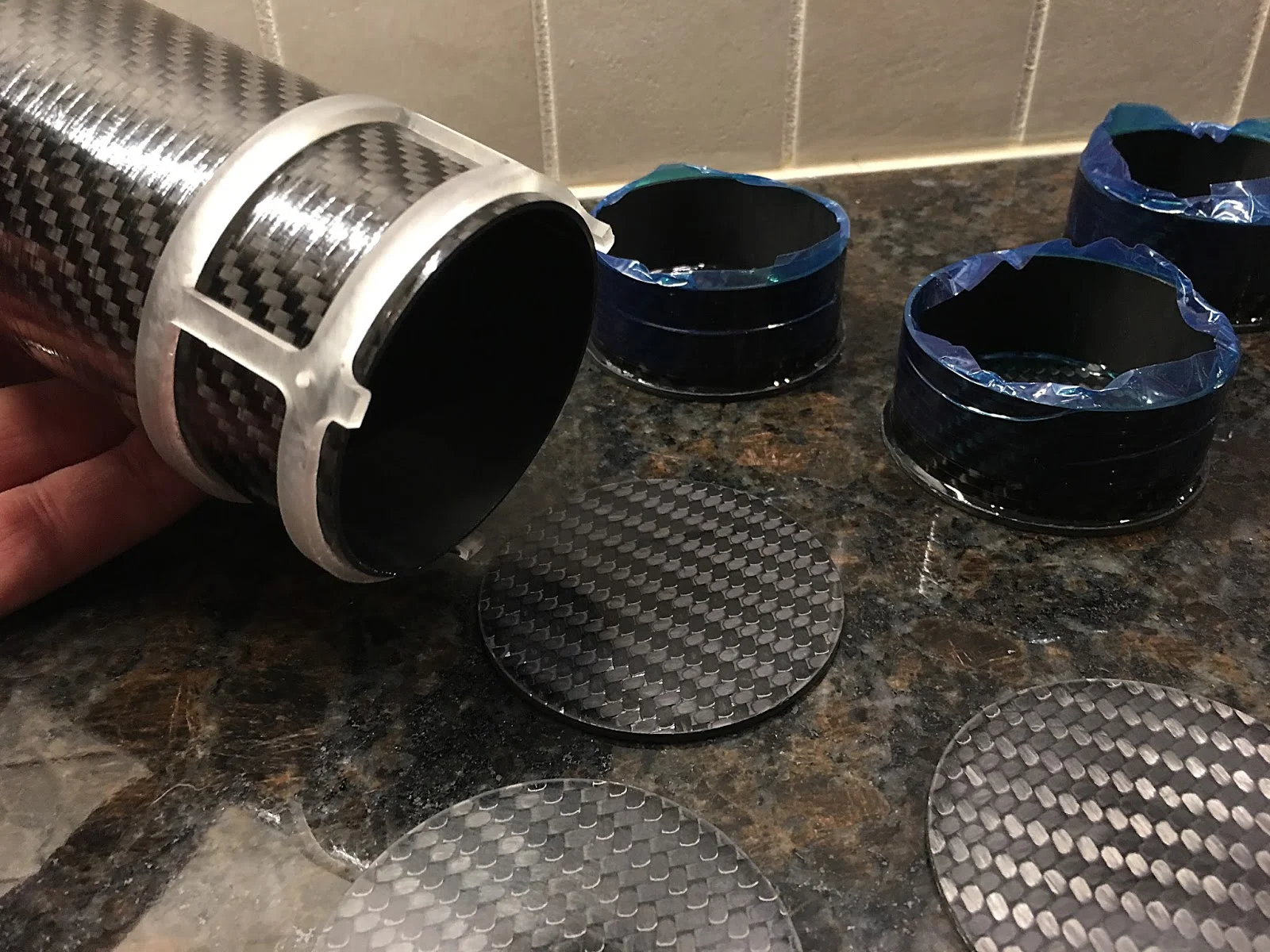 3D printed assembly jig on end of parachute mortar tube; ready for bonding