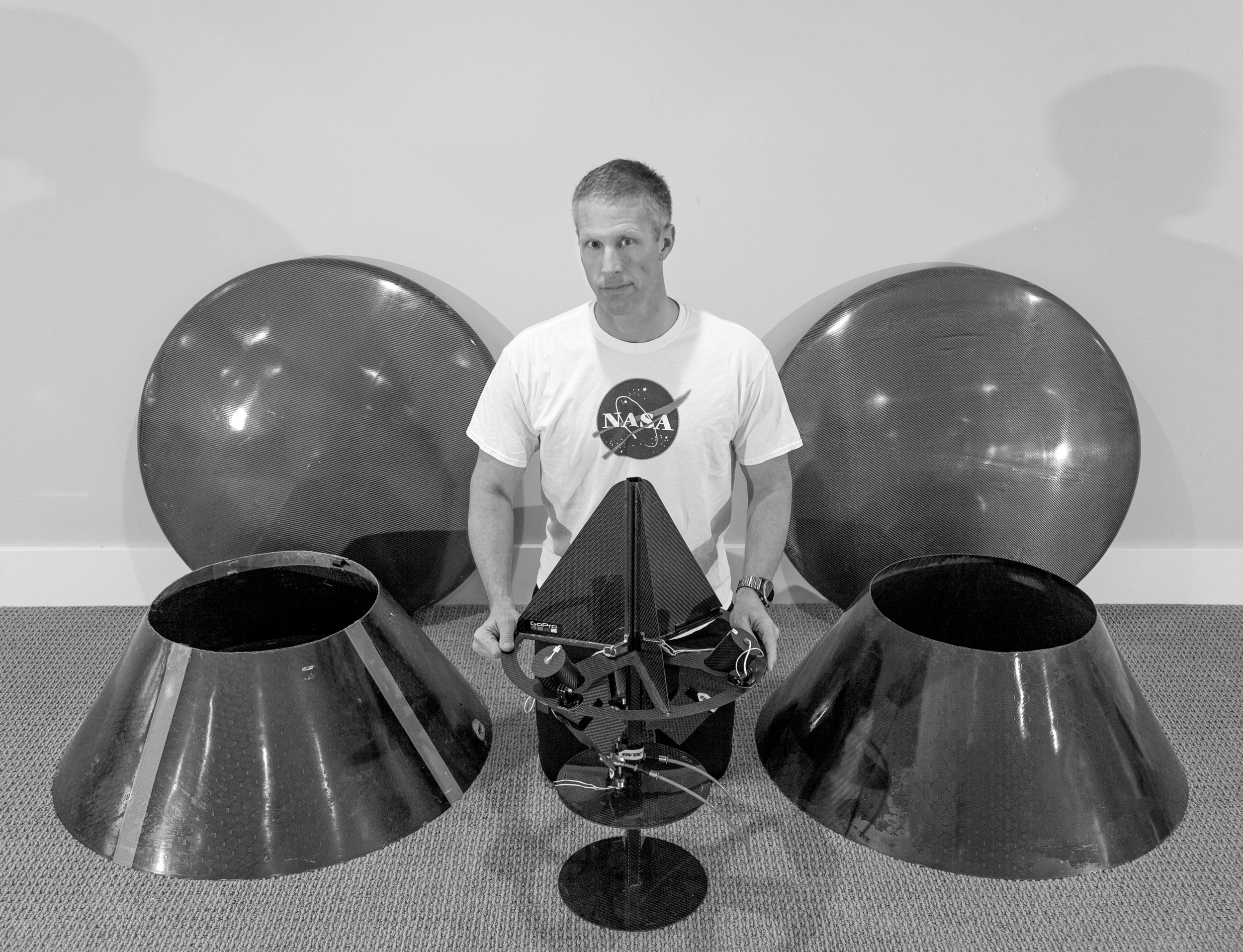 HAPP core structure with two sets of aeroshells. Development of the molds and fabrication process took several months. Copies of the parts can be produced from the molds in a few hours. That look on Chris's face is a mix of elation and exhaustion. Elaustion?