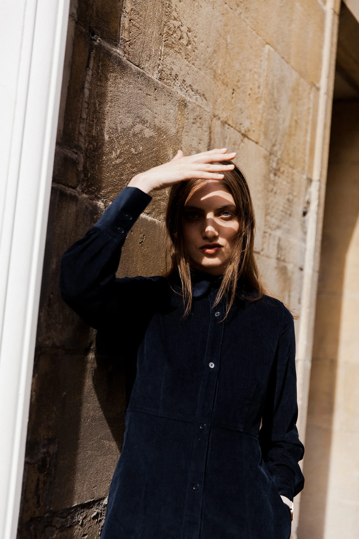 Cord shirt dress in dark navy, £160, Toast; Ruota hoop earrings by Laura Lombardi, £165, Found; Rose gold watch with marble face by CLUSE, £119.95, Quadri; Black velvet ribbon, as before
