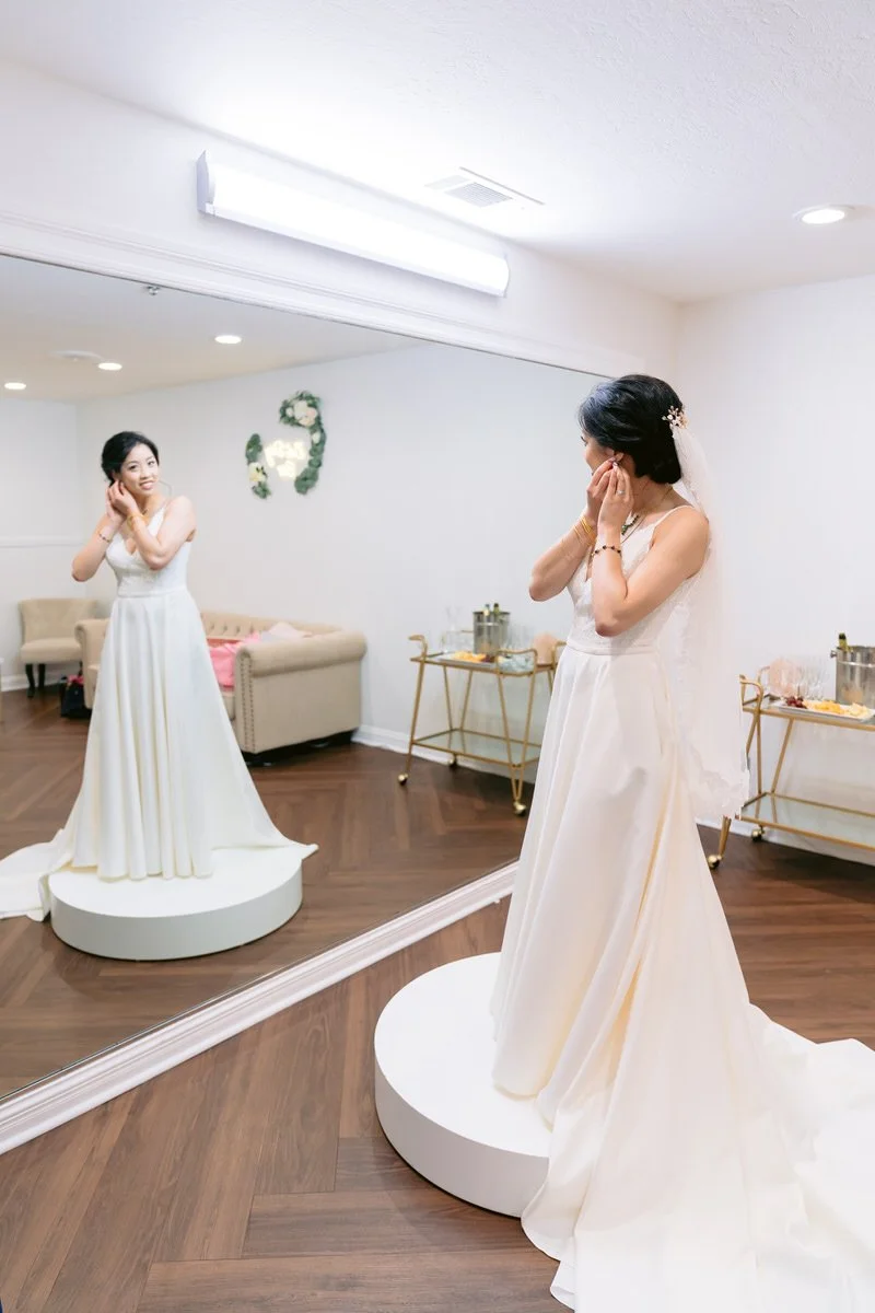 Bride getting ready at San Ramon Waters by wedgewood weddings bridal suite