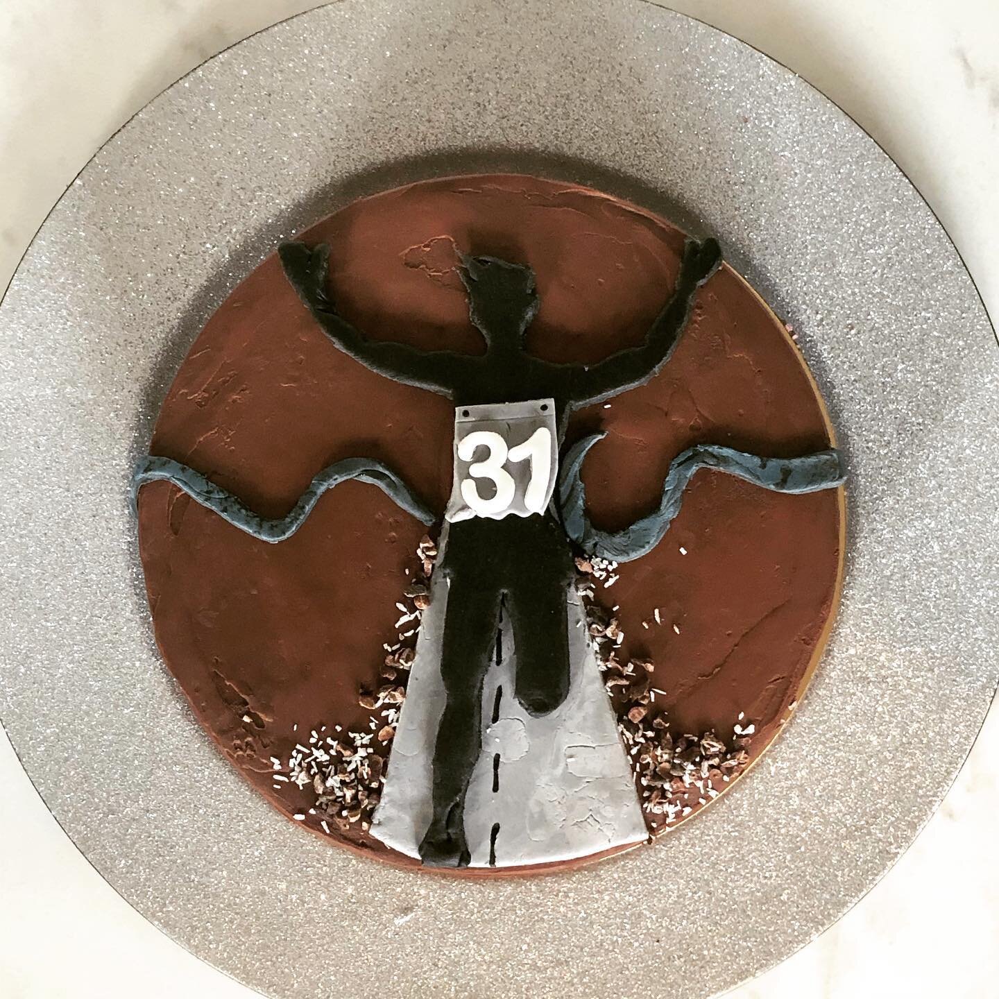 Next up... the Runner!
My client wanted a death by chocolate cake for her brother&rsquo;s 31st birthday, but wasn&rsquo;t sure about the design... nothing she found online seemed quite right. So I had this idea of cutting out a silhouette of a runner