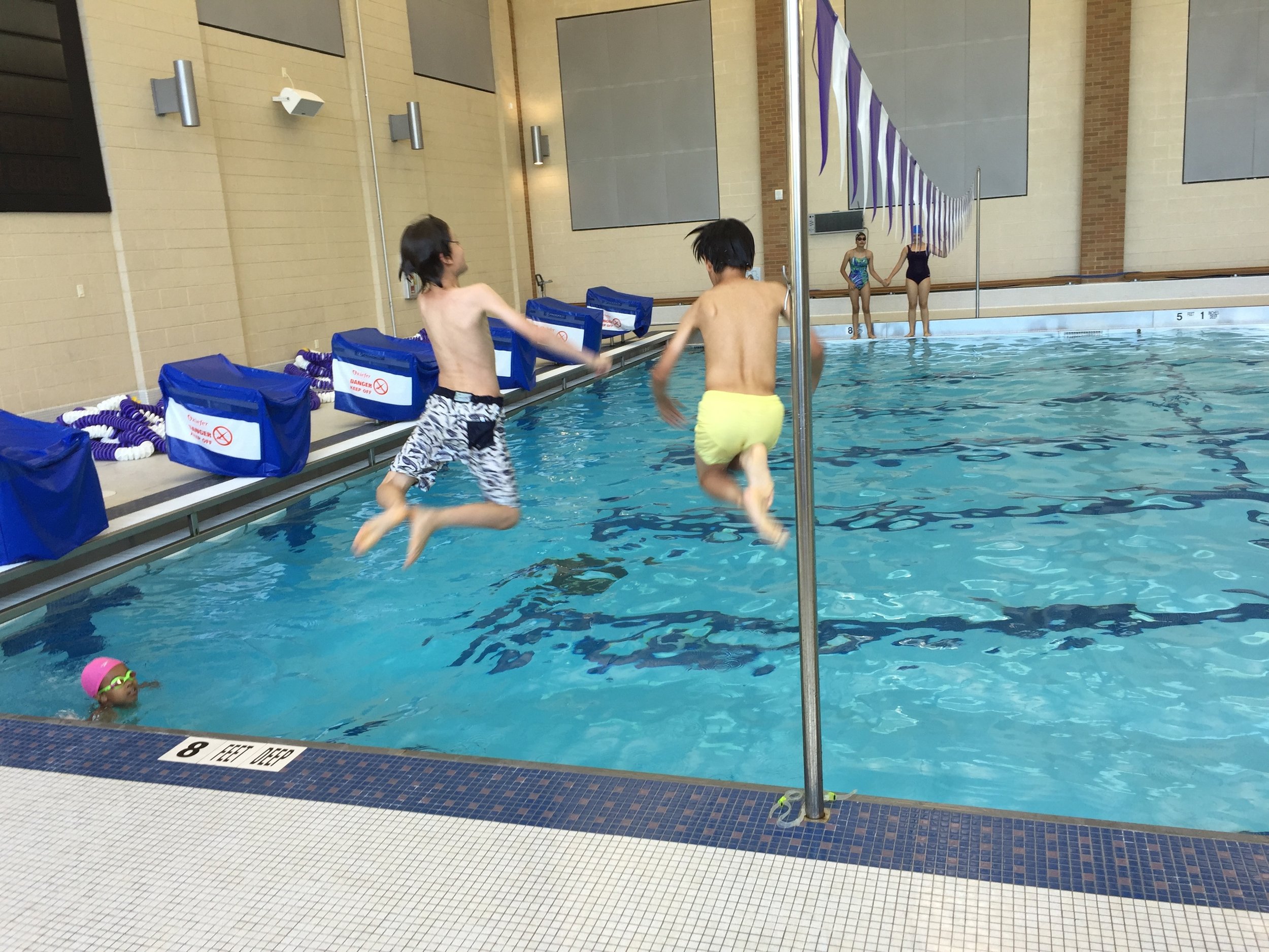 Orion Shogo jumping in pool.jpg
