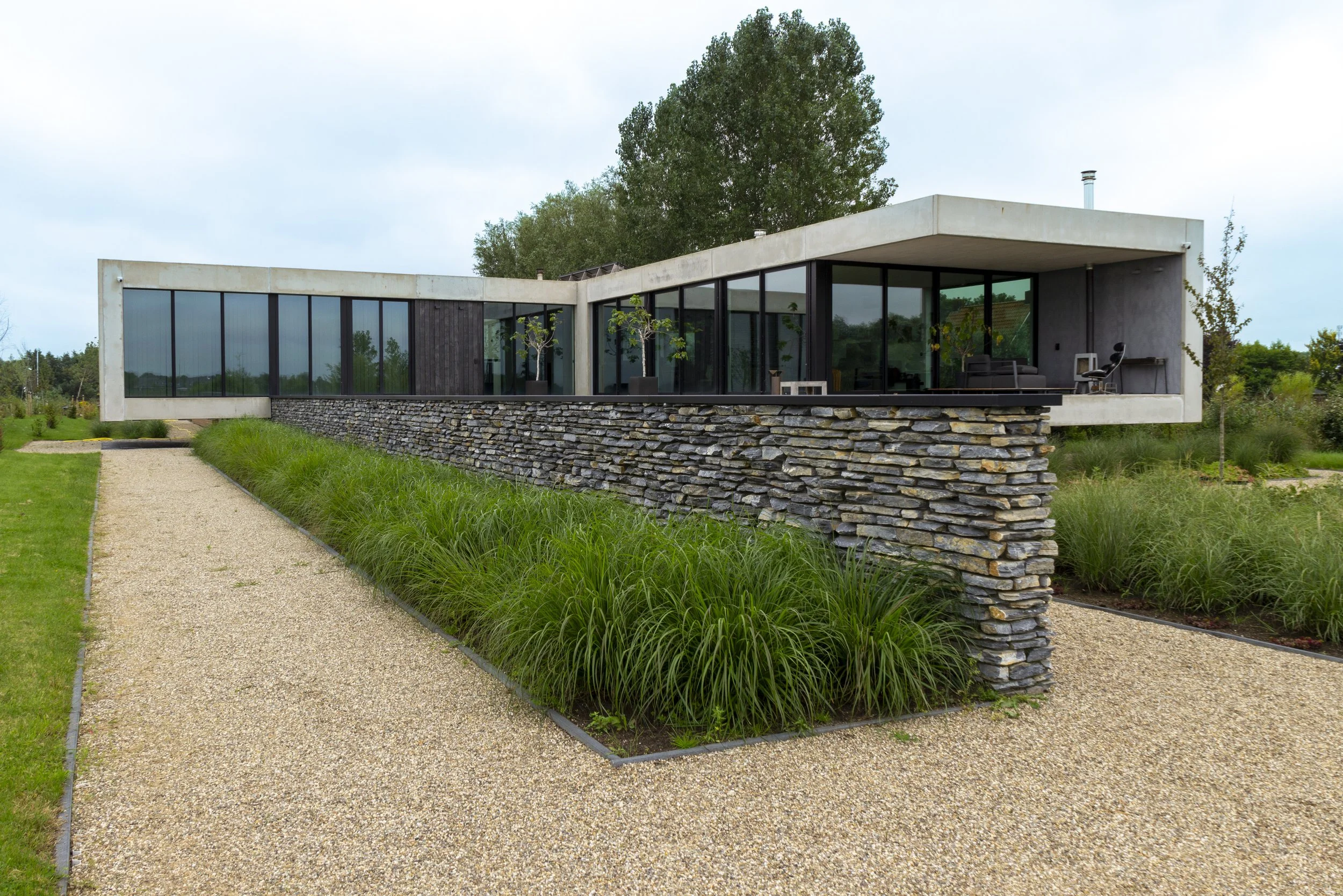 Drachten-Unieke villa-Blue Petra-NGBouwenmetNatuursteen-2.jpg