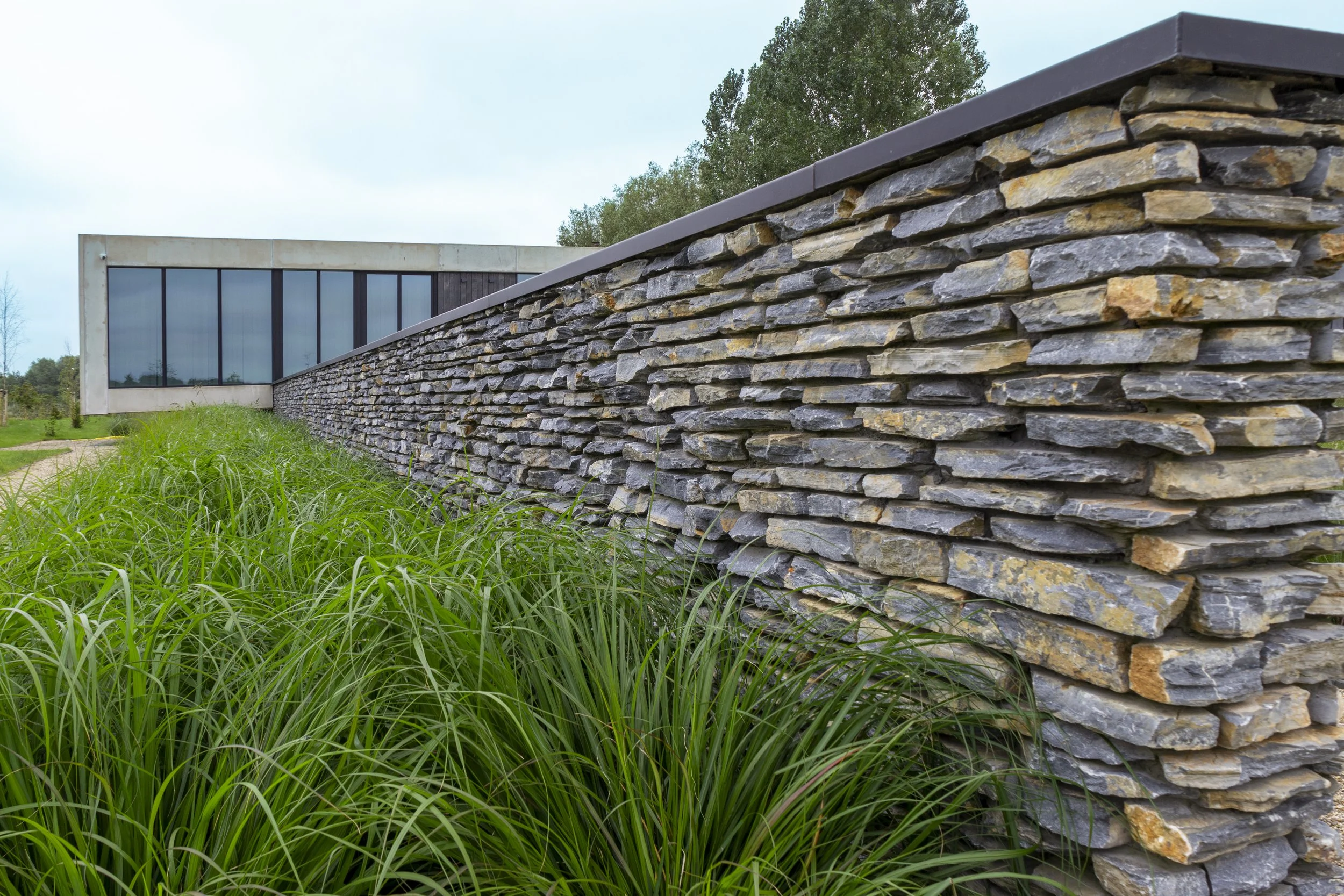 Drachten-Unieke villa-Blue Petra-NGBouwenmetNatuursteen-9.jpg