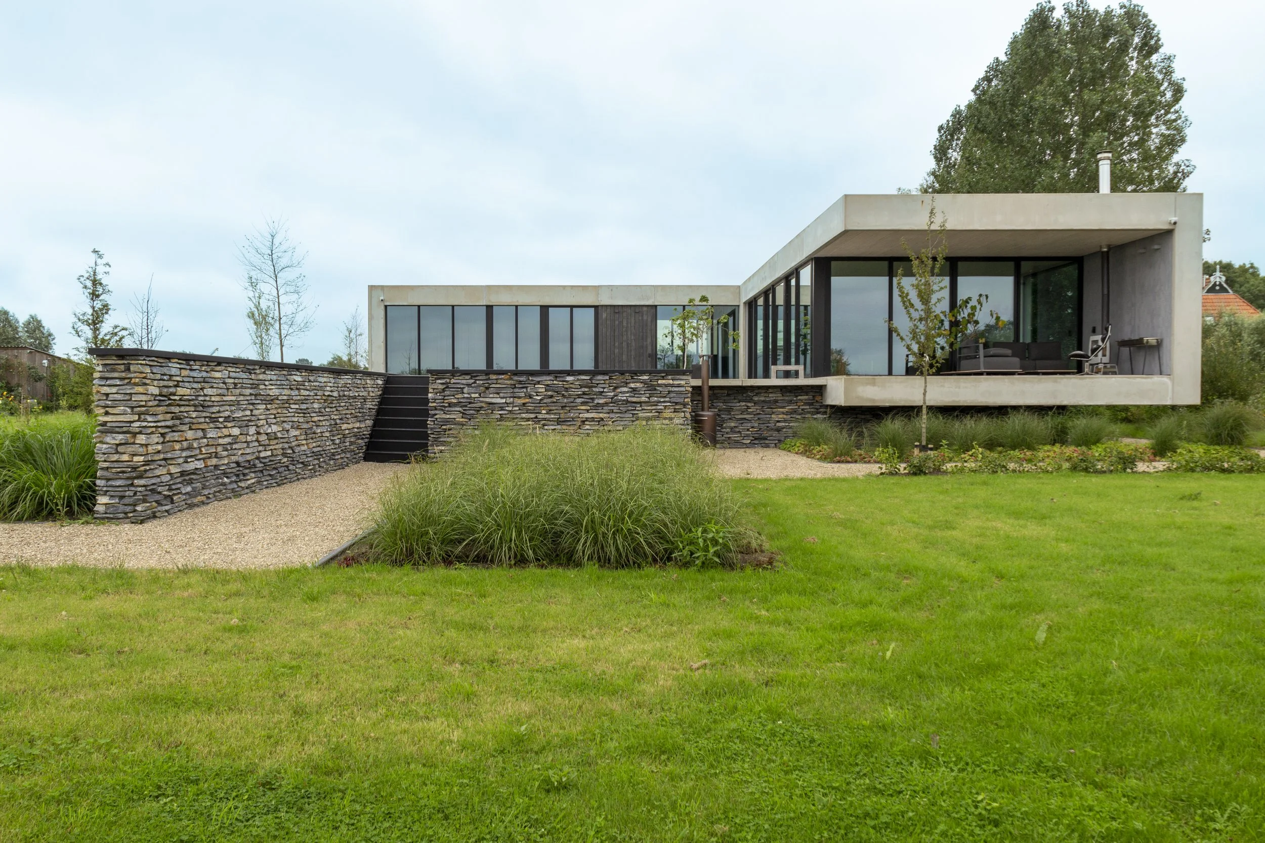 Drachten-Unieke villa-Blue Petra-NGBouwenmetNatuursteen-3.jpg