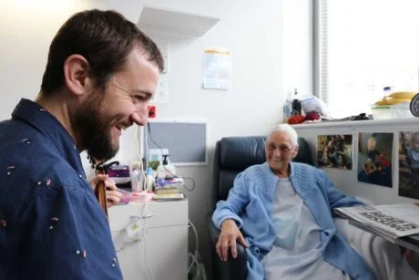 PHOTO Courtesy of ABC Hobart. Marion Hayes, 75, often asks guitarist Will Parsell to play her favourite country and western tunes.