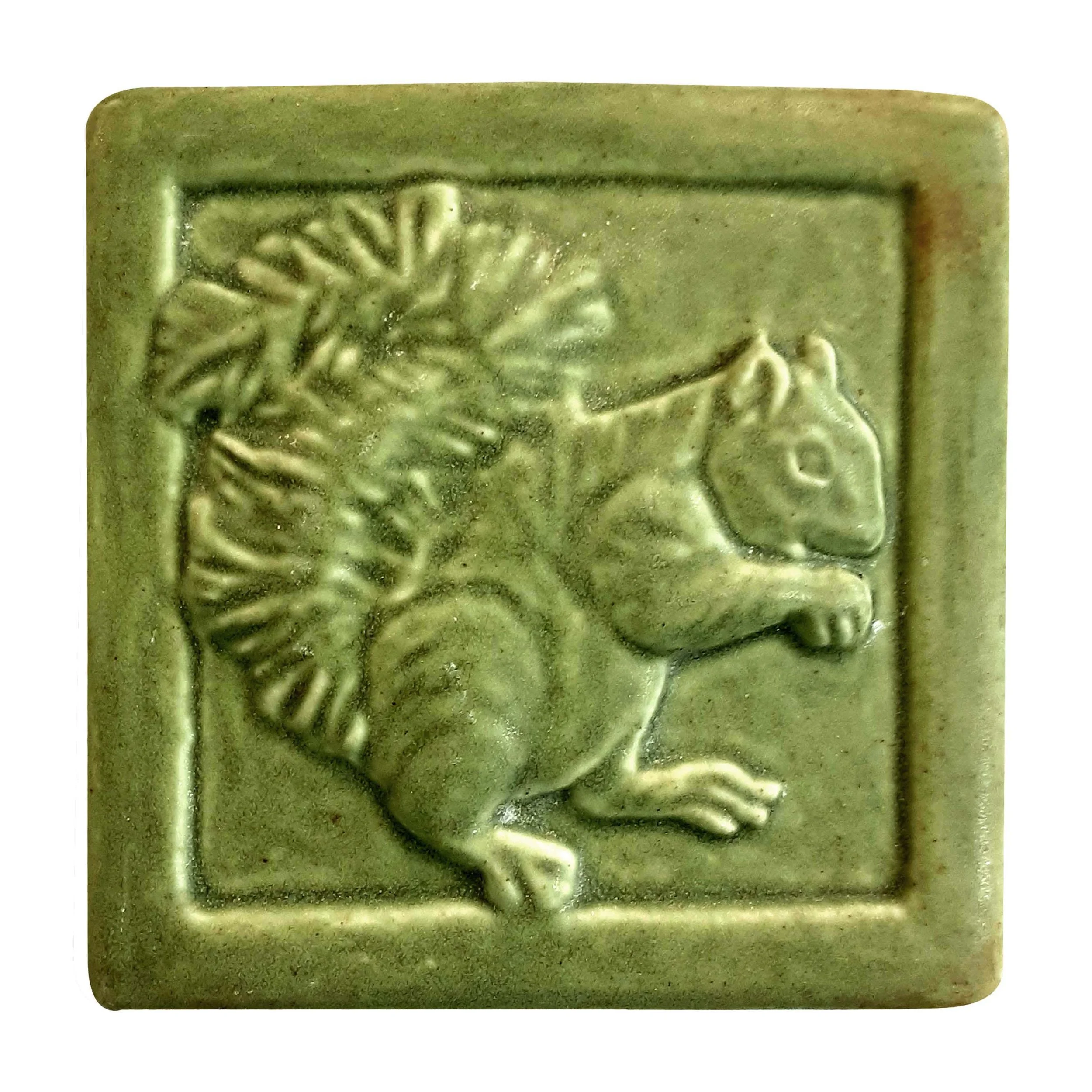 Handmade 4x4 porcelain Fred Squirrel art tile with high-relief detail. Michigan artisan ceramic for DIY kitchen backsplashes and woodland wall decor. Moisture-resistant rustic nature gift.