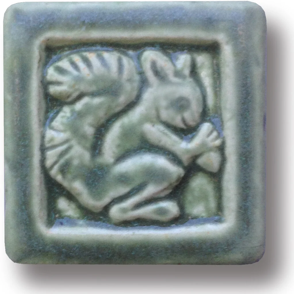 Suirrel Ar Tile in Smoky Blue Glaze. 3x3 inches hand made in Michigan