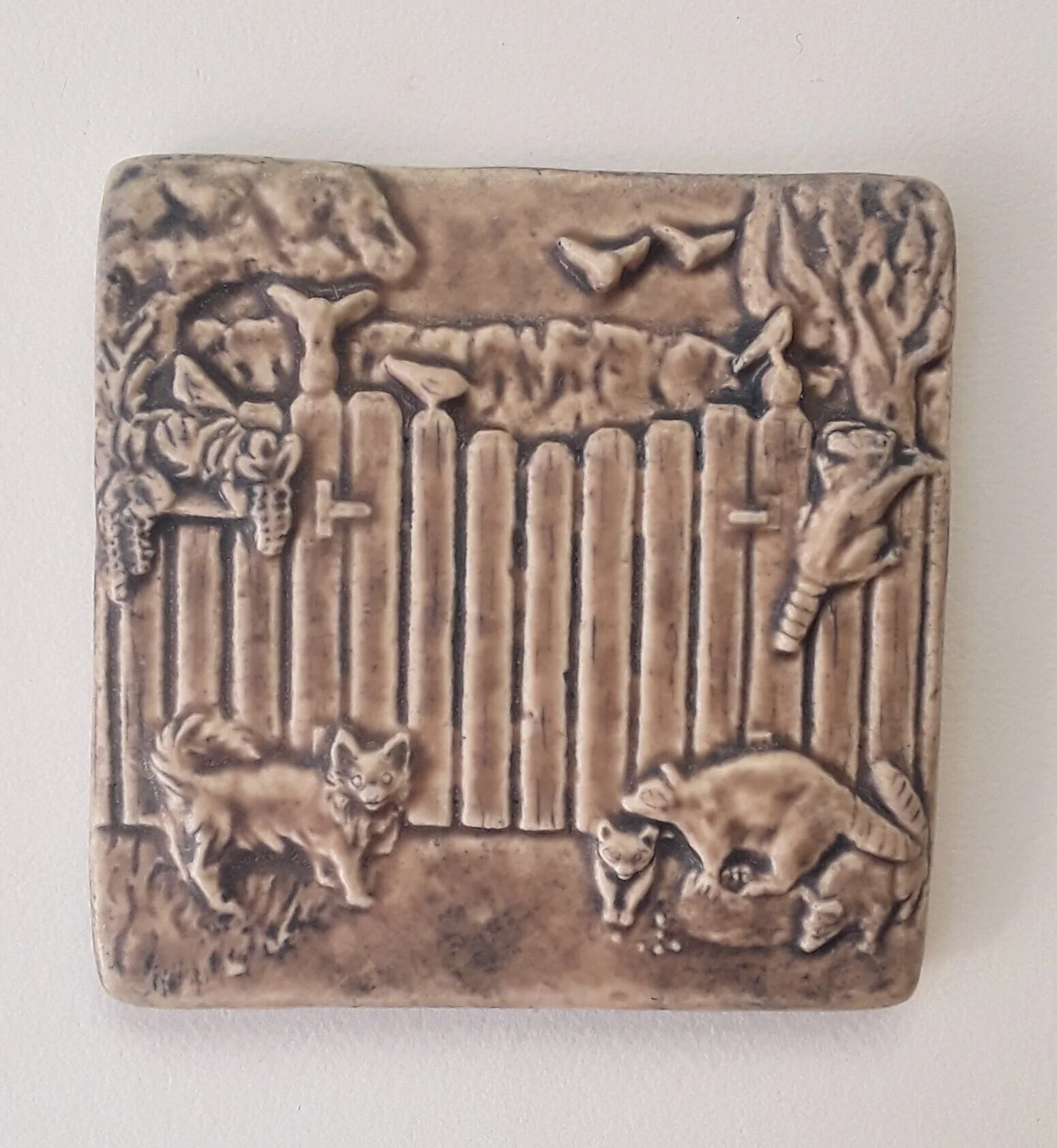 Dog with Raccoons Art Tile