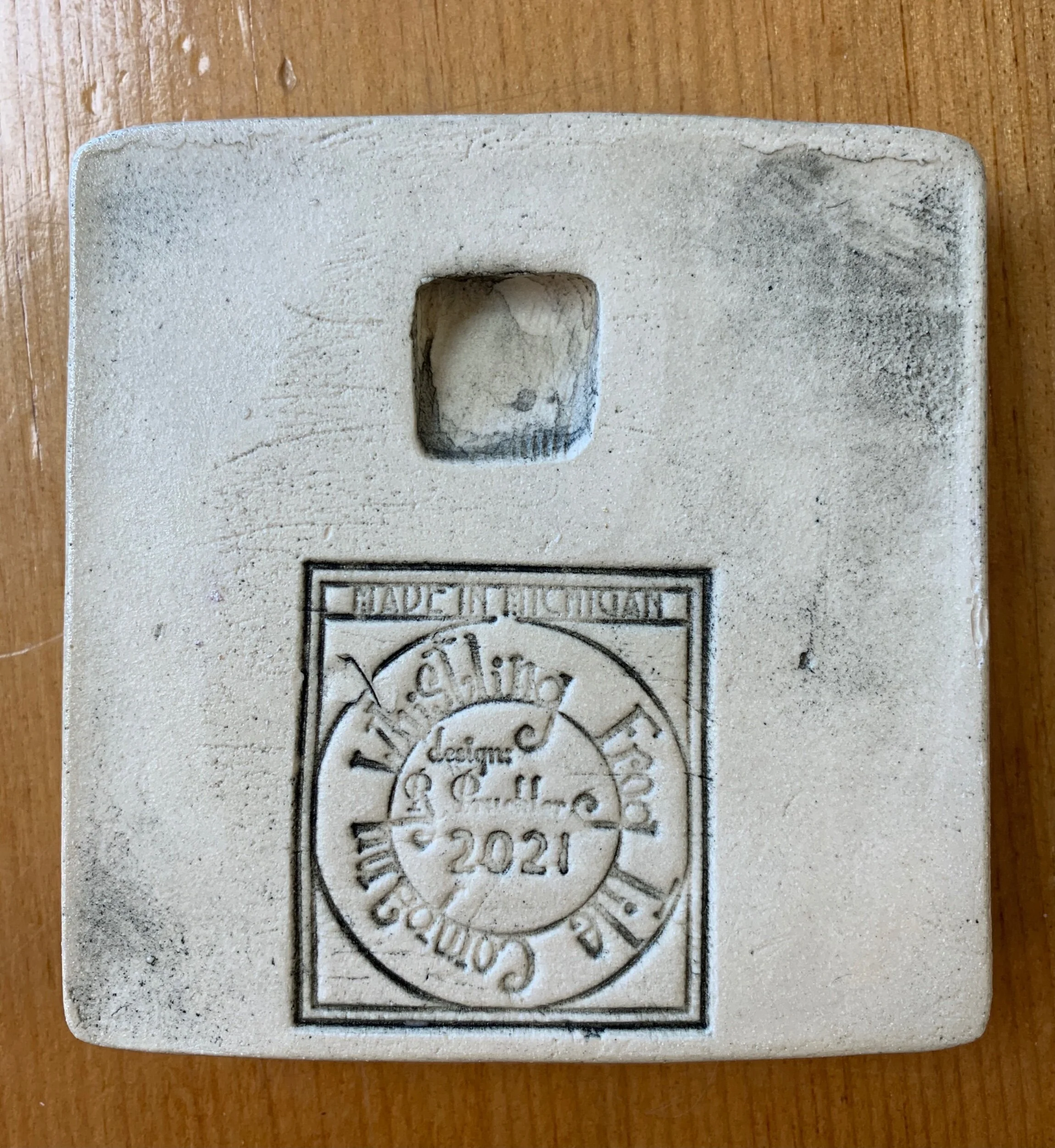 Tiles are notched for display hanging