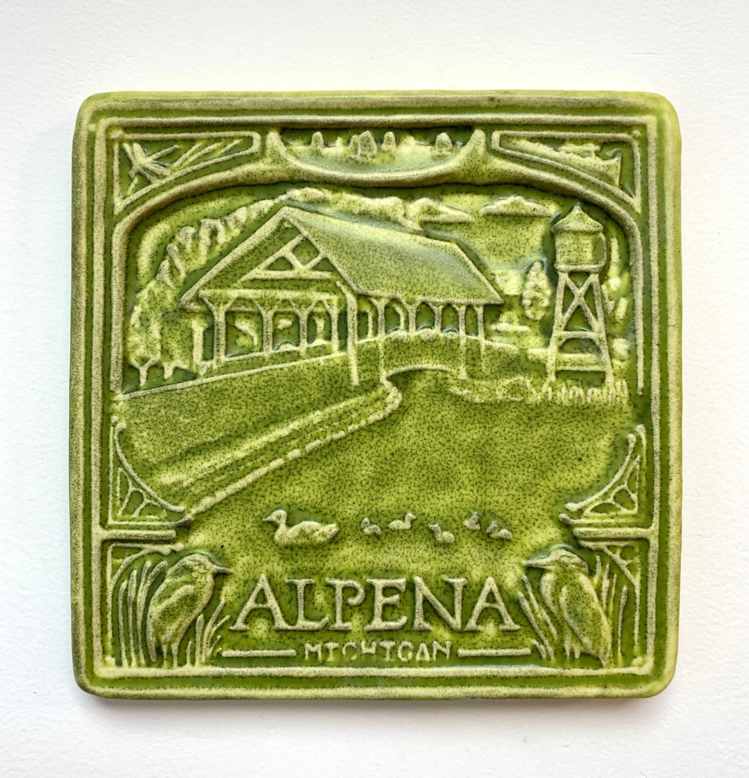 Celebrate Alpena, Michigan with this 6x6" handmade porcelain tile. Perfect for a unique housewarming gift or a permanent backsplash installation. Ships in 2 weeks.