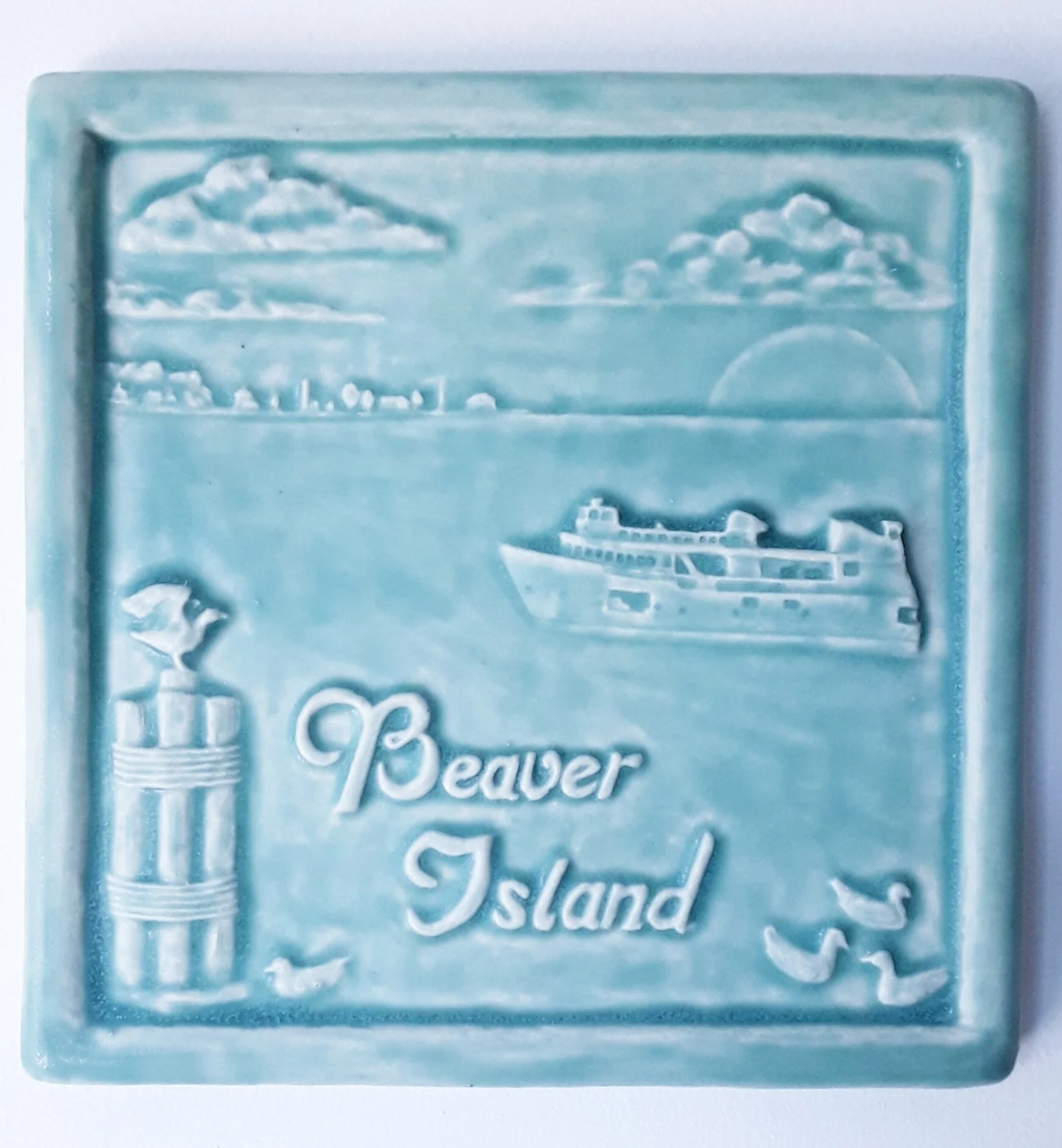 Beaver Island Art Tile in Bermuda Aqua glaze by Whistling Frog Tile