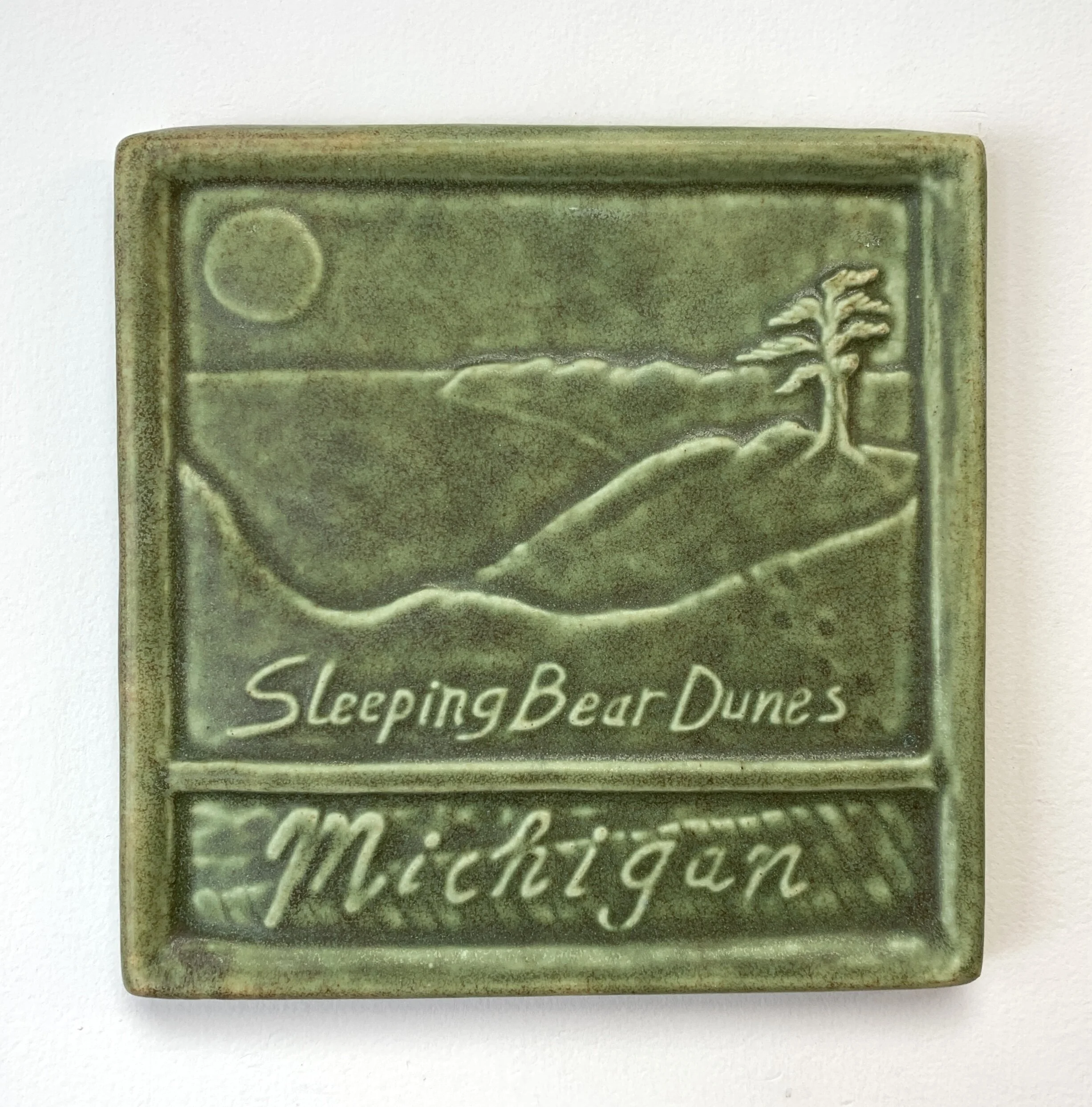 Sleeping Bear art tile in Oak Hill green glaze