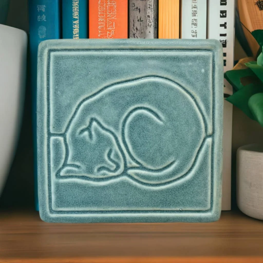 Minimalist cat art tile sculpted by Rick