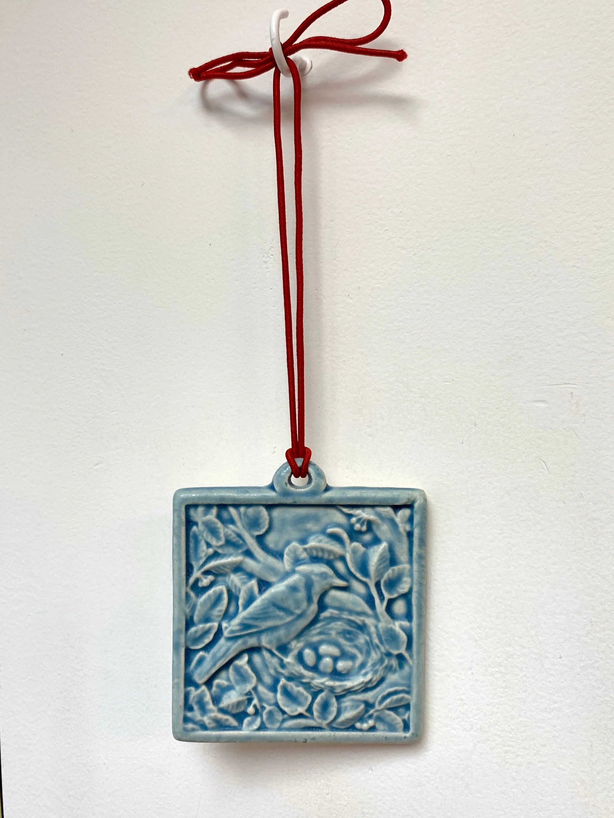 Nesting Jay ornament in Freshwater Blue glaze