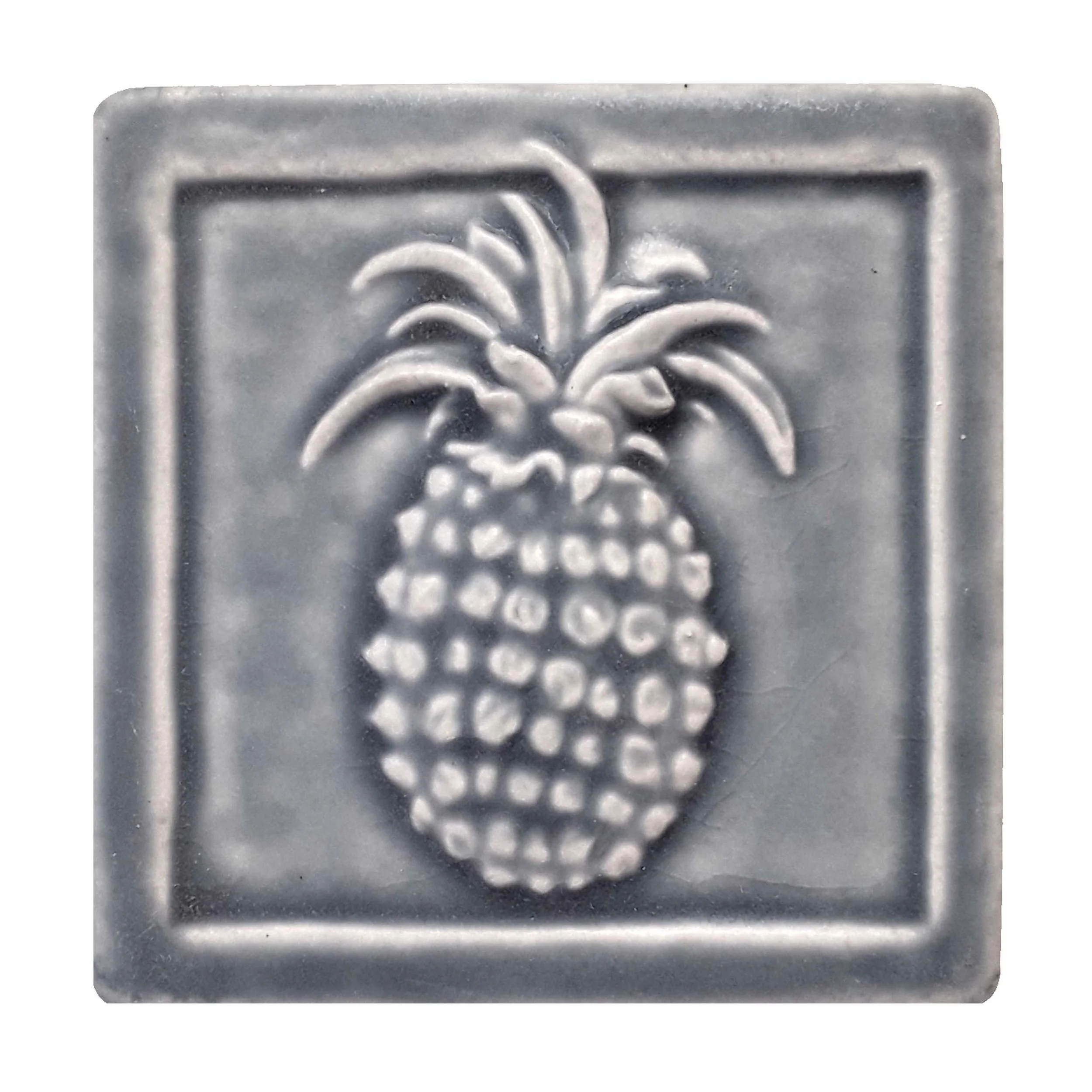 Handmade 4x4 porcelain Pineapple art tile. Michigan artisan ceramic for kitchen backsplashes and hospitality-themed wall decor. Moisture-resistant housewarming gift.