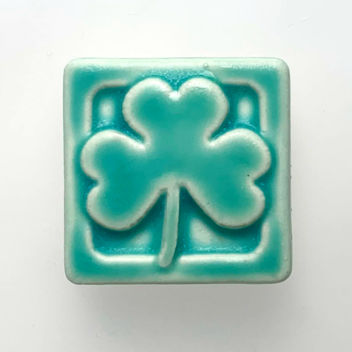Handmade 2x2 porcelain Shamrock Art Tile, Irish luck gift, St. Patrick's Day decor, ceramic mini tile for installation or display, Irish heritage accent.
