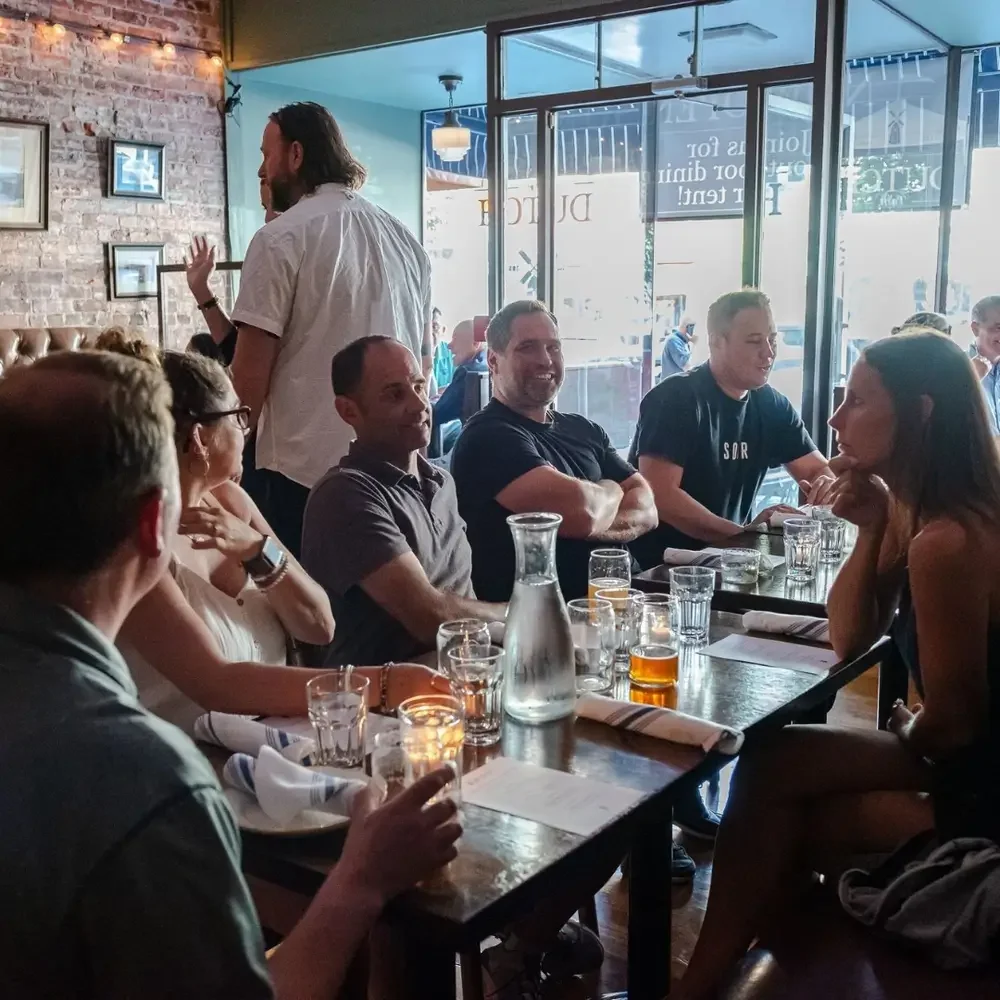A group dines at The Dutch Ale House in the Hudson Valley, NY.