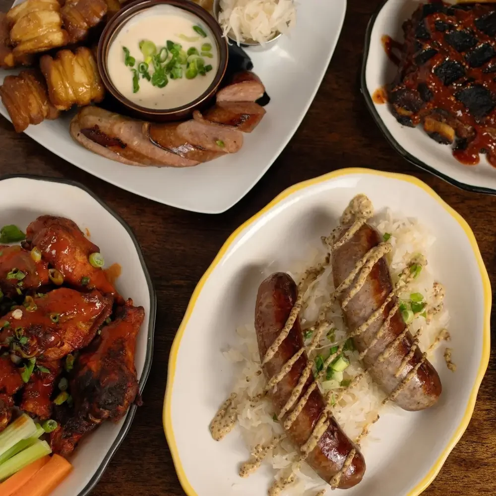 Top down view of various plates of food at the Dutch Ale House in Saugerties, NY