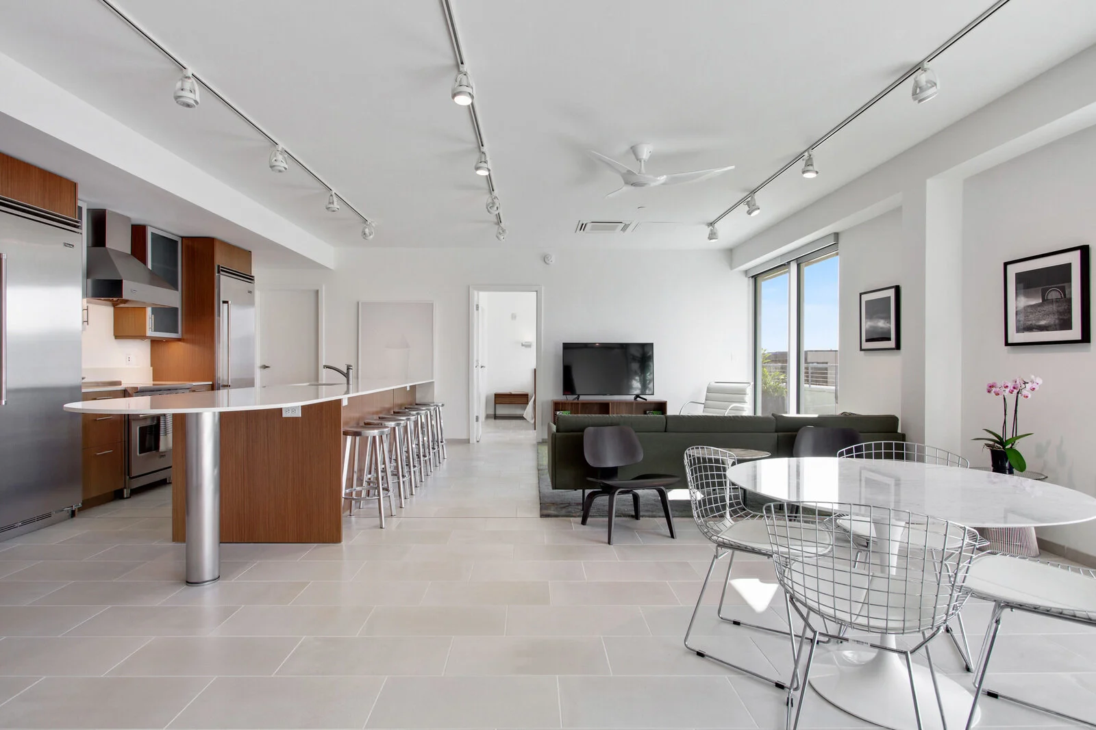  The kitchen and living room inside condo complex The Garage in New Orleans, LA 