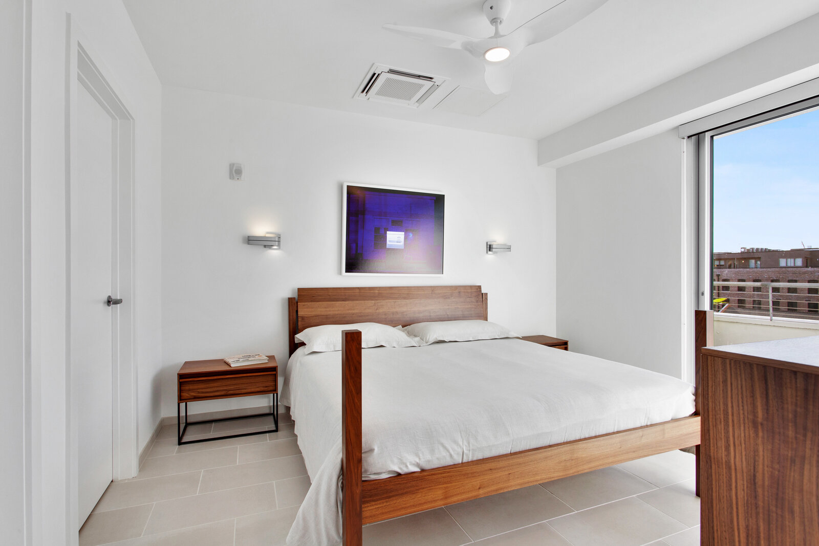  Apartments for Rent French Quarter LA - The Garage - Bedroom with Bright Light and White Walls 
