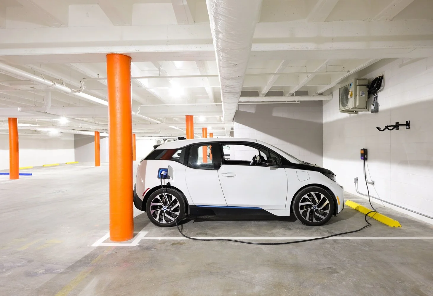  Parking spot with an electric car charging station at The Garage condo complex in New Orleans, LA 